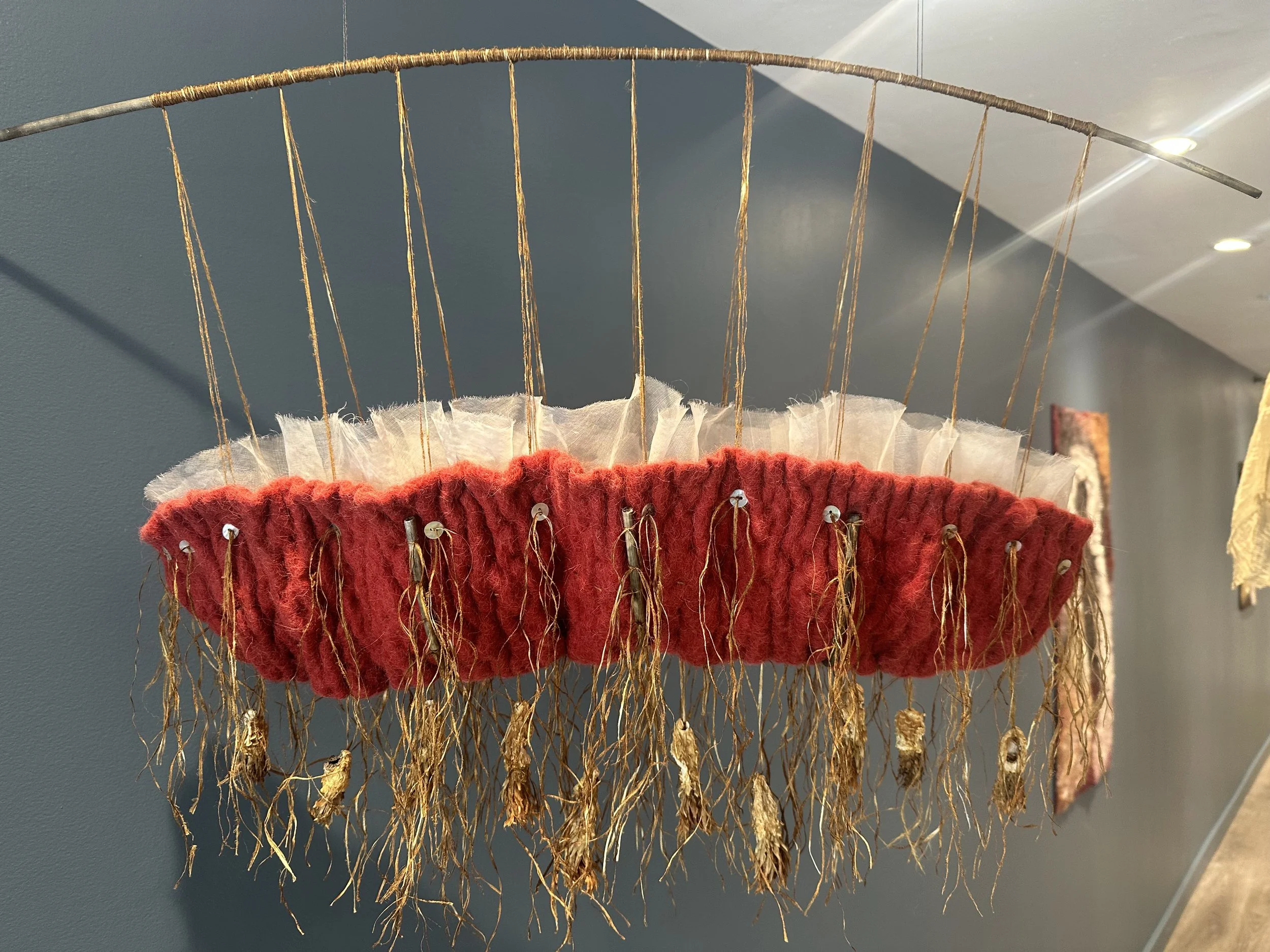 Red Cradle, 2022  2’6”h x 2’w  Wool, silk, cactus seed pods; Madder dye  $2,000