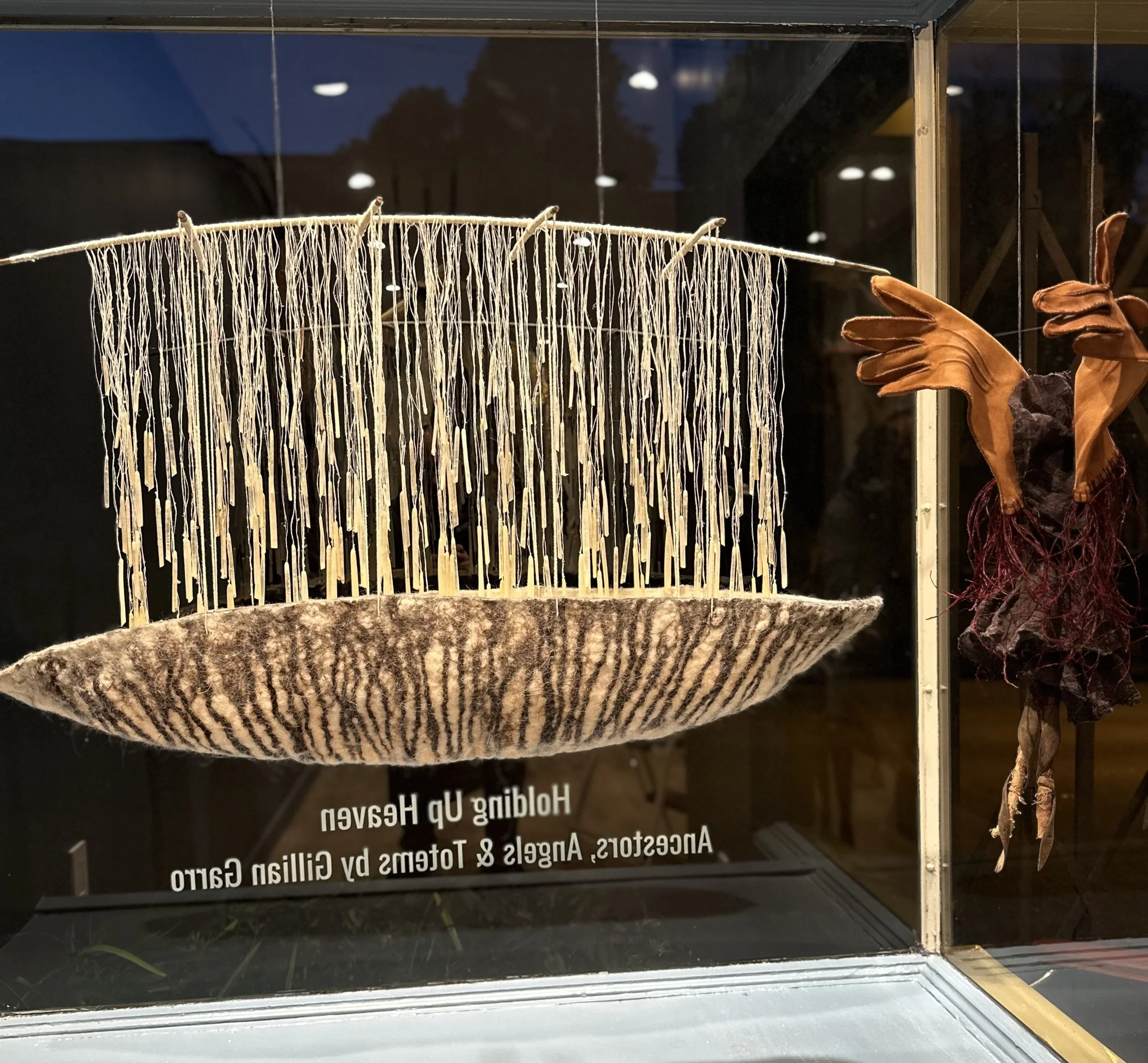 Feather Cradle 2022  3’2”w x 2’ h  Wool, silk, feather shafts  $2,000.