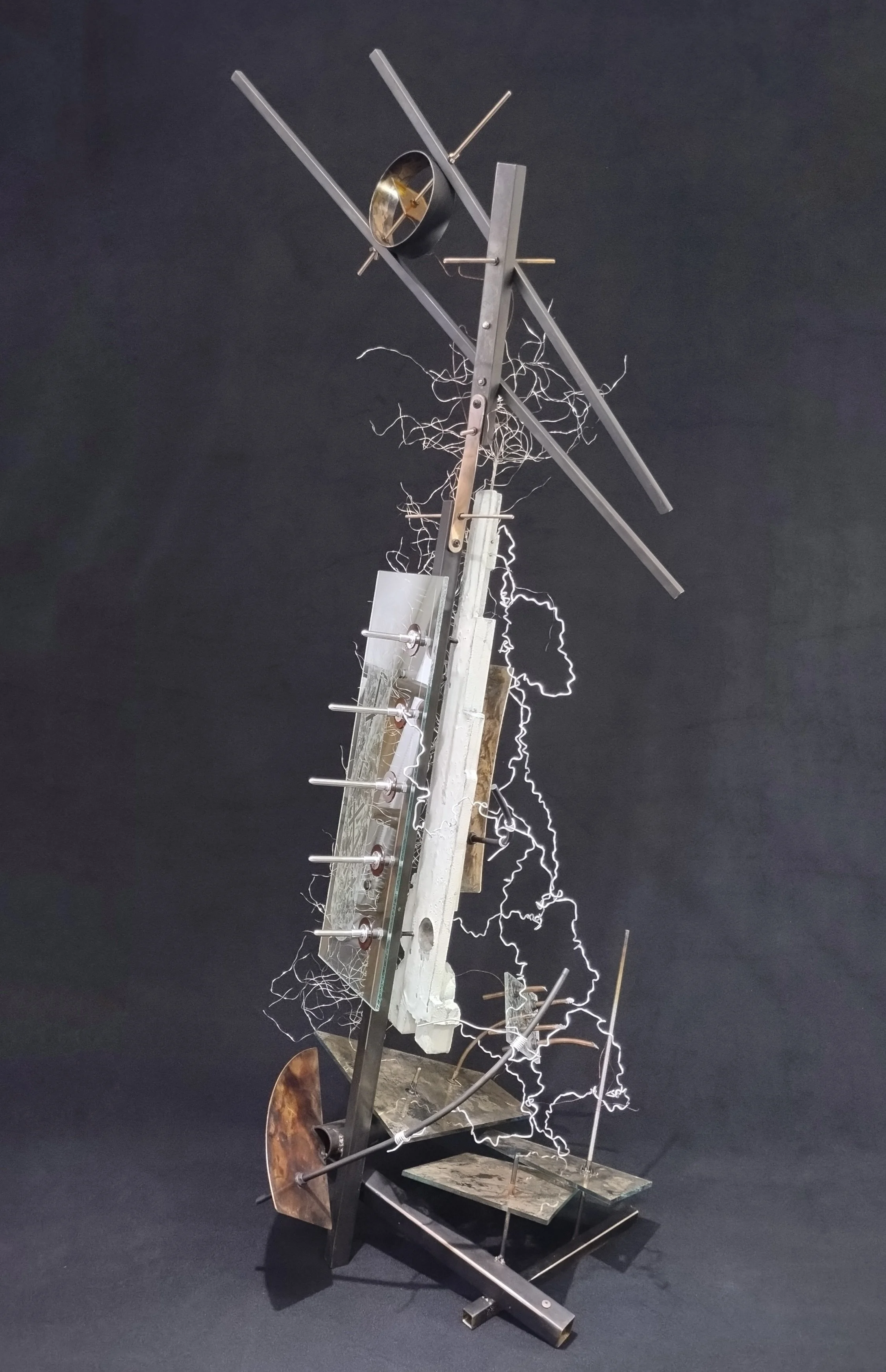 Danny Rosales, Enigma, 2026, concrete, glass and metal, 58x24x124", $6,000