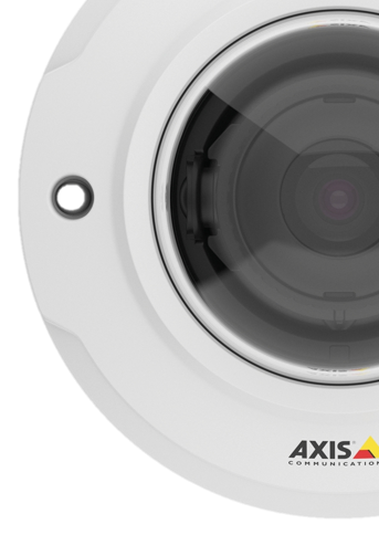 Close-up of a white Axis communication security camera lens.