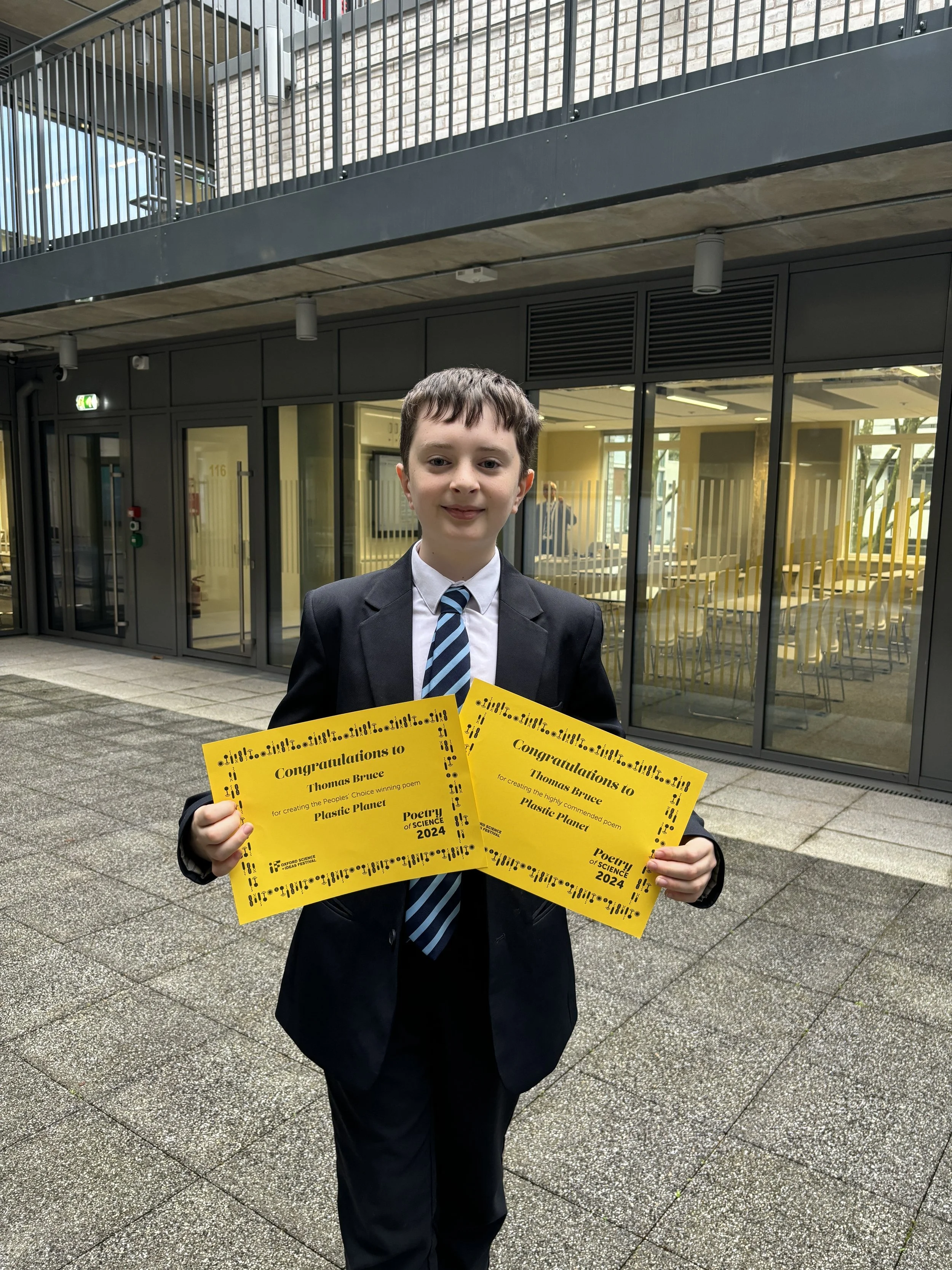 Thomas Triumphs at Oxford Poetry of Science &amp; Wins People’s Choice Award
