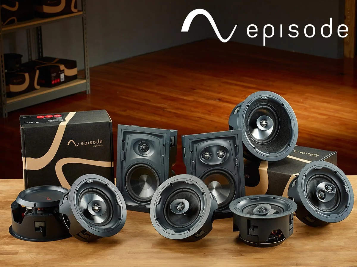 A lineup of Episode in-ceiling speakers shown on the table