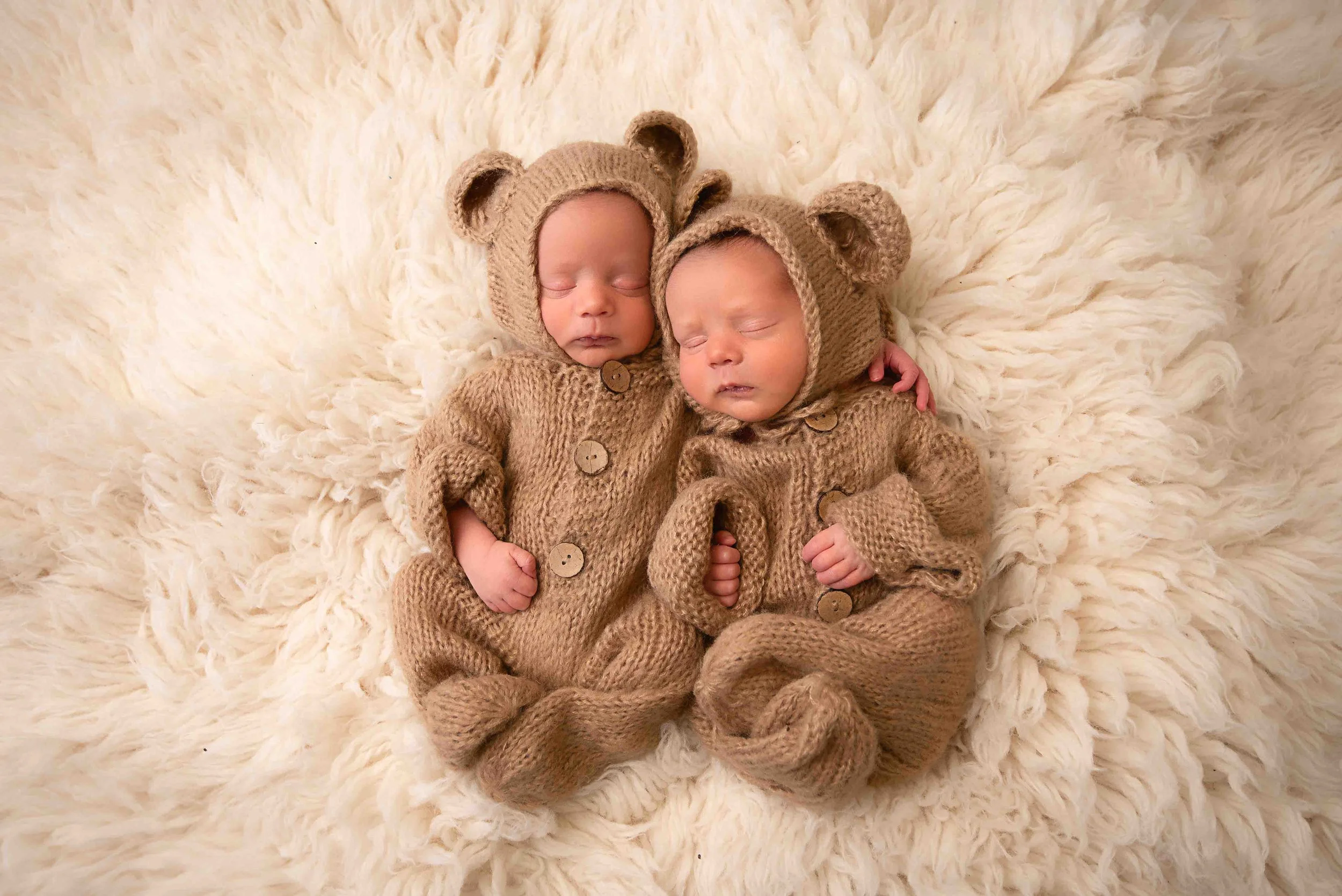 Rhode Island newborn photography twin baby boys in brown bear onesies sleeping in studio by Anna Kay Photography
