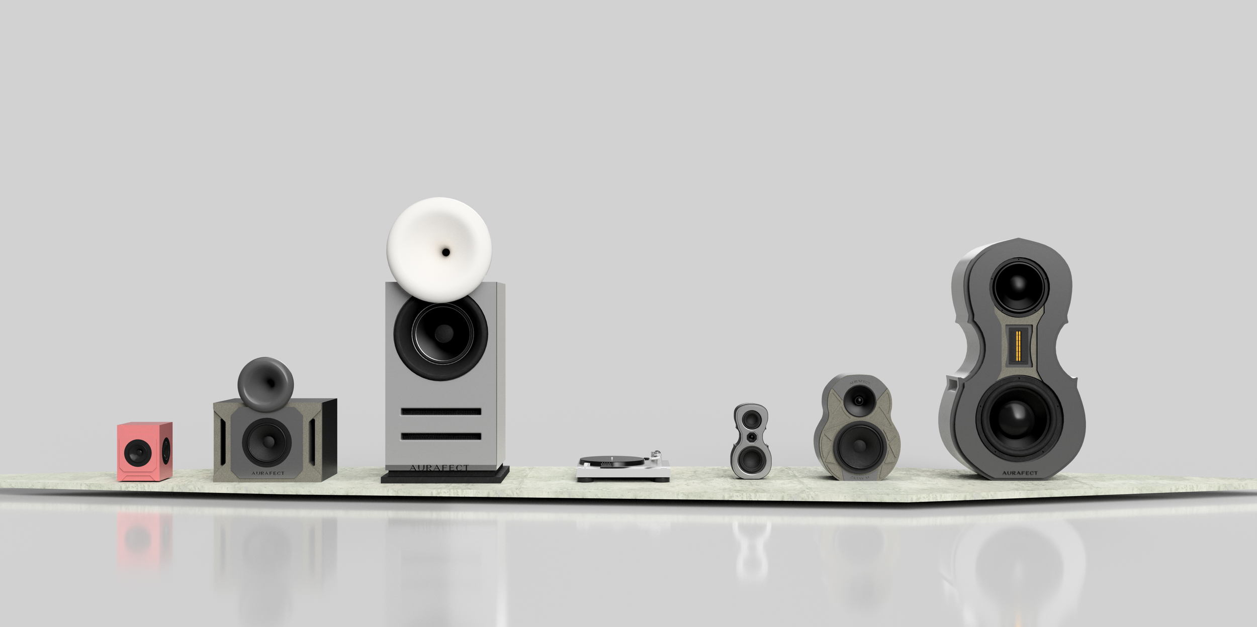 A collection of all currently available Aurafect speakers. From left to right, Mini Box-Y, Box-Y, Big Box-Y, Oktav S, Oktav M, Oktav L. Various colour combinations and material choices are shown to highlight ability to customise.