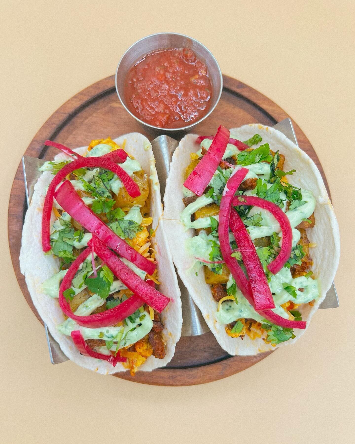 Now Serving&hellip;Chorizo Breakfast Tacos 🌮 Filled with egg, roasted potatoes, chorizo, cheese and topped with avocado cr&eacute;ma, pickled onions and cilantro. They&rsquo;re too good to resist 🔥 Have you gotten a taste yet? 

#txlocal #arlington