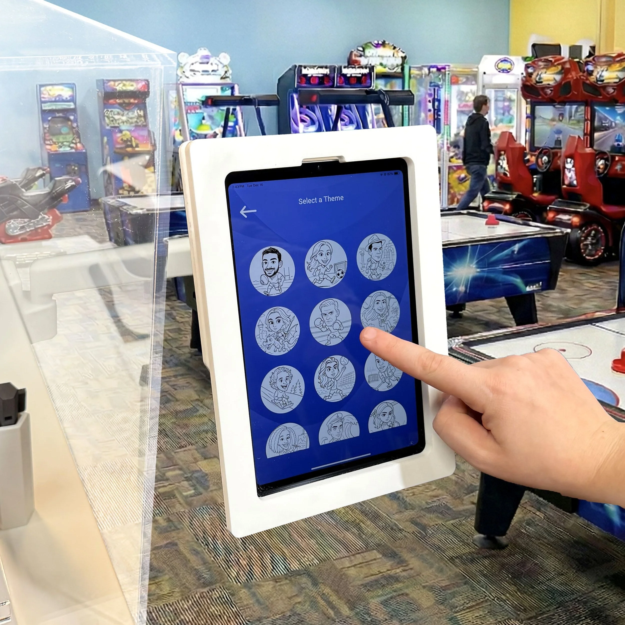 Person selecting a theme for SketchBot Pro to draw