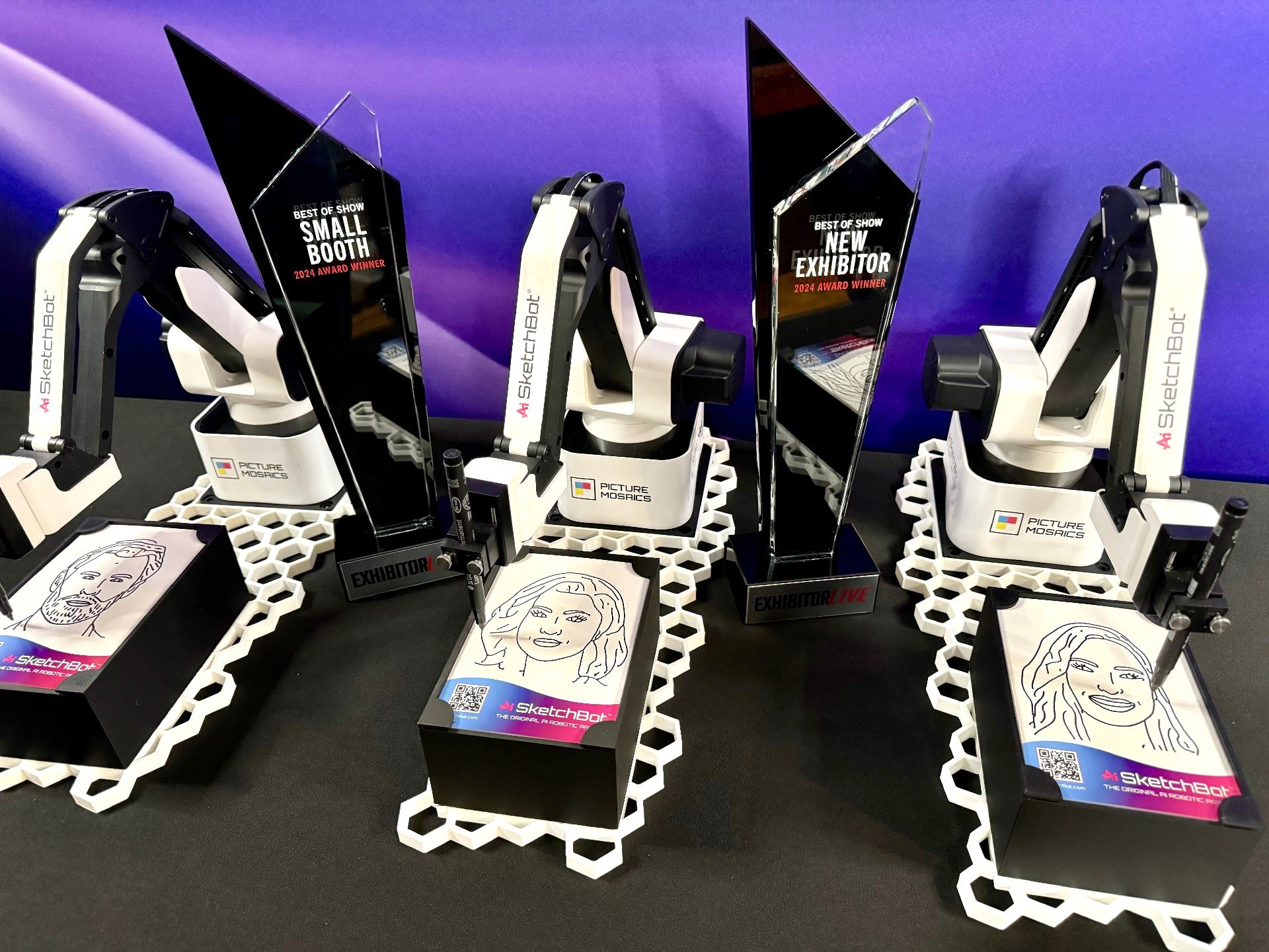 Ai SketchBots with their two awards won at Exhibitor Live