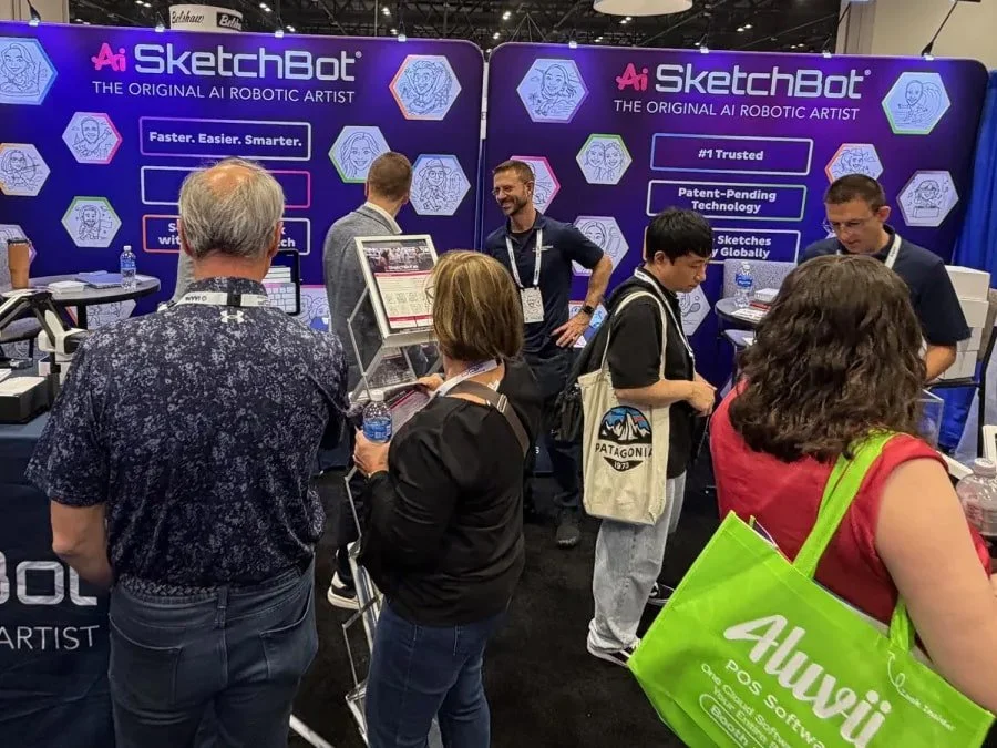 Buzzing Ai SketchBot booth at IAAPA