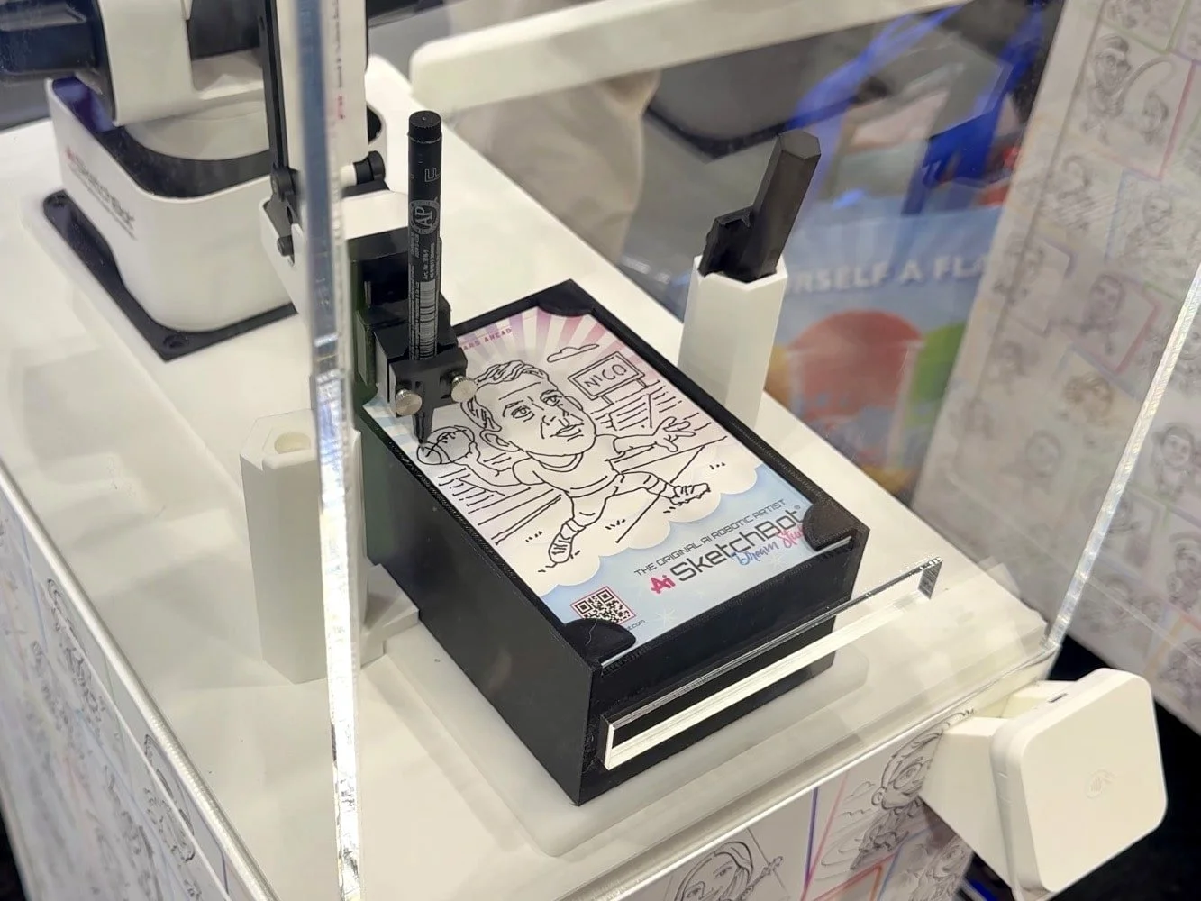 Personalized sketch by SketchBot at IAAPA