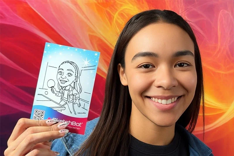 Guest holding up a sketch of herself as a ping pong player drawn by SketchBot