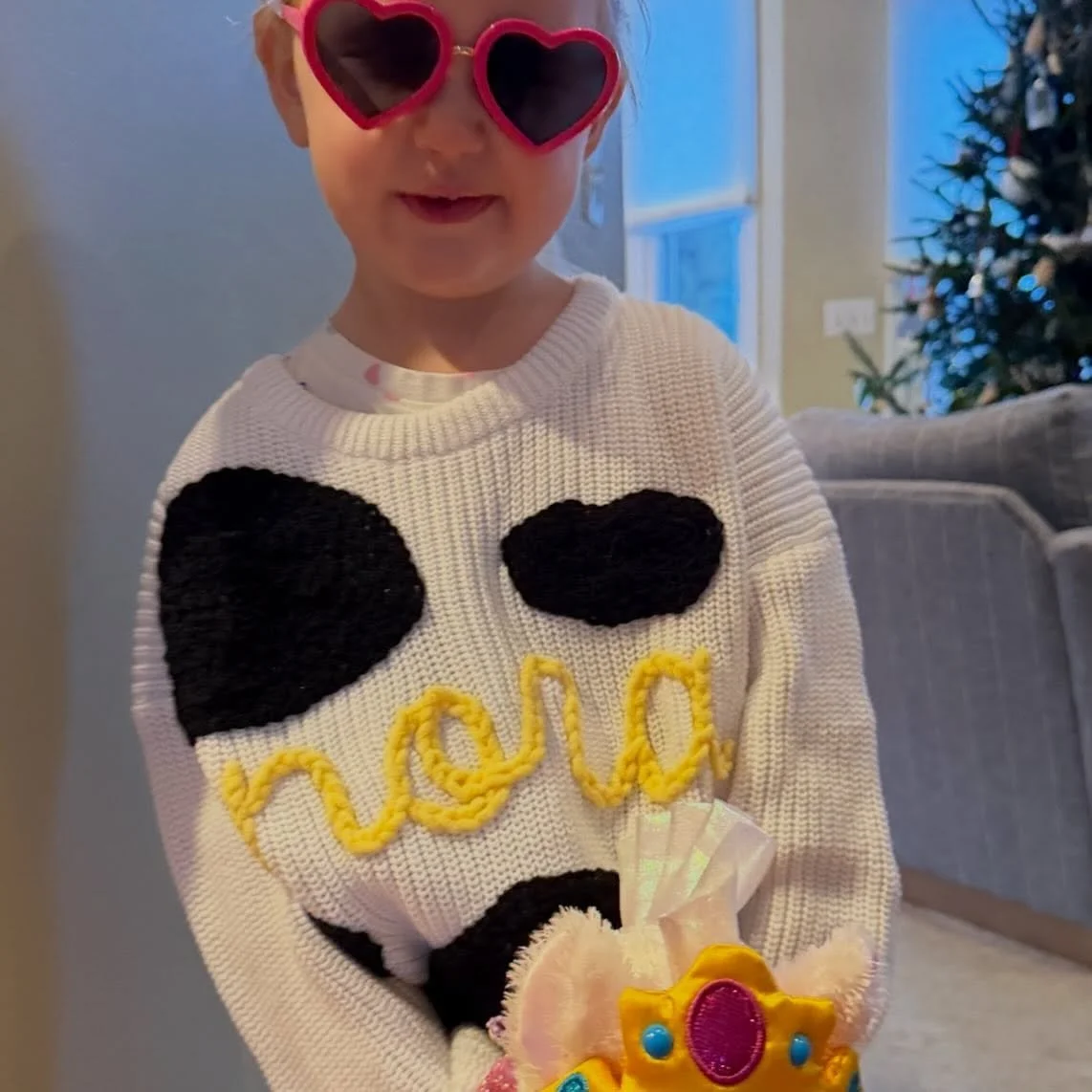 Just a cow obsessed girl in her customized and personalized hand stitched sweater with lettering &ldquo;Nora&rdquo; and design of cow print. 🐄🤠