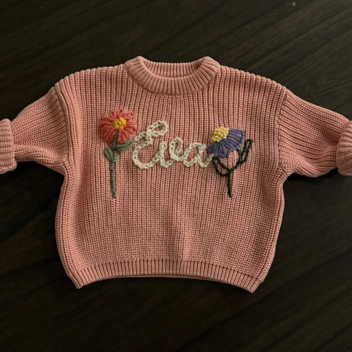 Keep your kiddos cozy in Lei &amp; Gray personalized hand embroidered sweaters. 💕Blush sweater with design and lettering chosen. 🌸