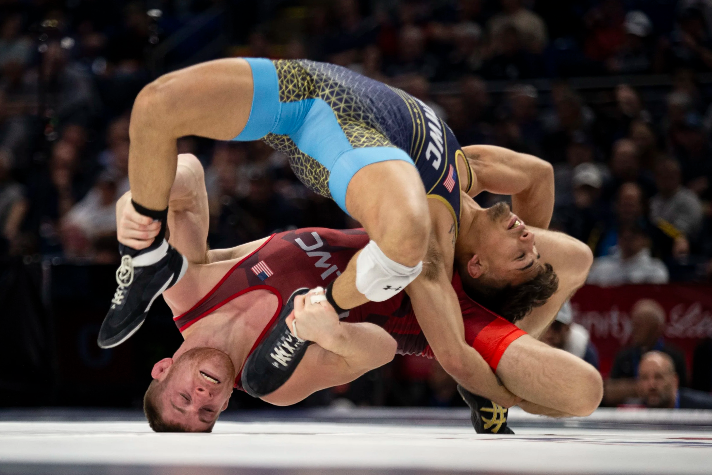 Nick Lee turns Andrew Alirez in a 65kg semifinal match during day one of the 2024 USA Wrestling Olympic Team Trials at the Bryce Jordan Center on Friday, April 19, 2024 in State College, Pennsylvania.