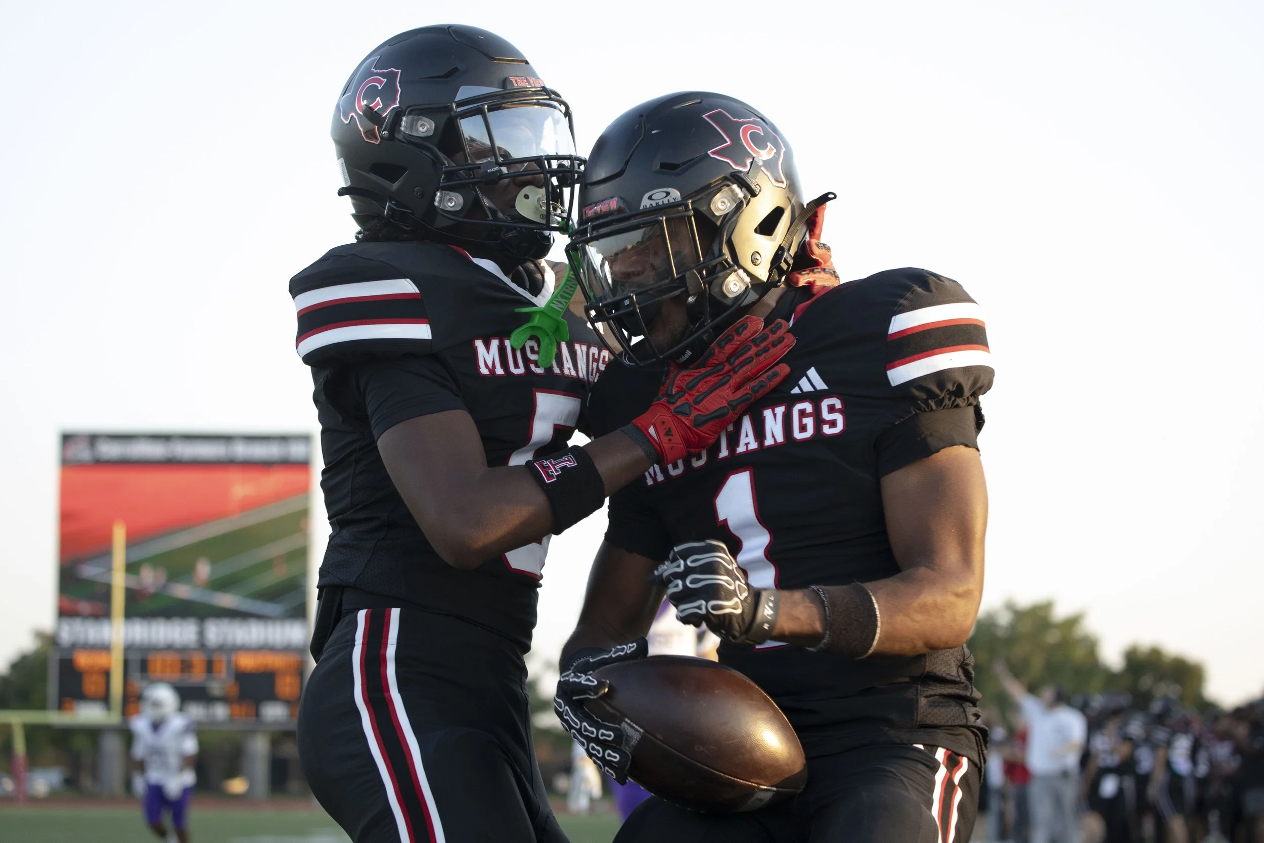 Creekview wide receiver Brendyn Shed (1) (right) celebrates with teammate Tay Evans after scoring a touchdown during a regular season football game between Creekview and Sunset at Tommy Standridge Stadium on Friday, Sept. 12, 2025. (Daniel McGregor-H