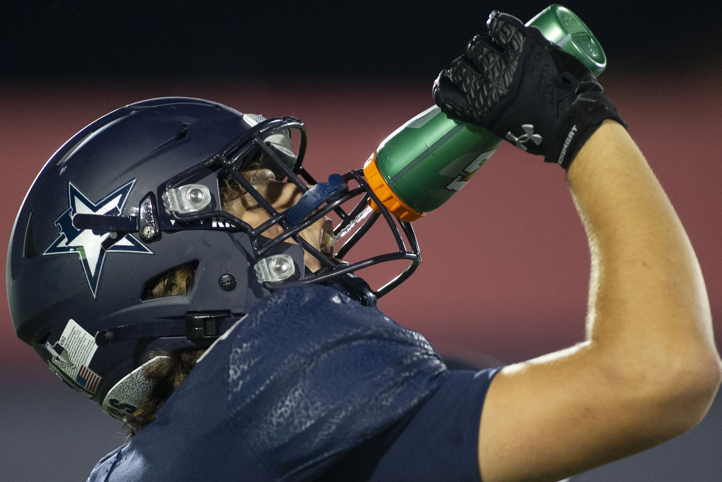 Lone Star Linebacker Lucas Cisneros (6) gets a drink of water during a regular season game against Frisco Centennial at Toyota Stadium on Friday, September 19, 2025. (Daniel McGregor-Huyer/Star Local Media)