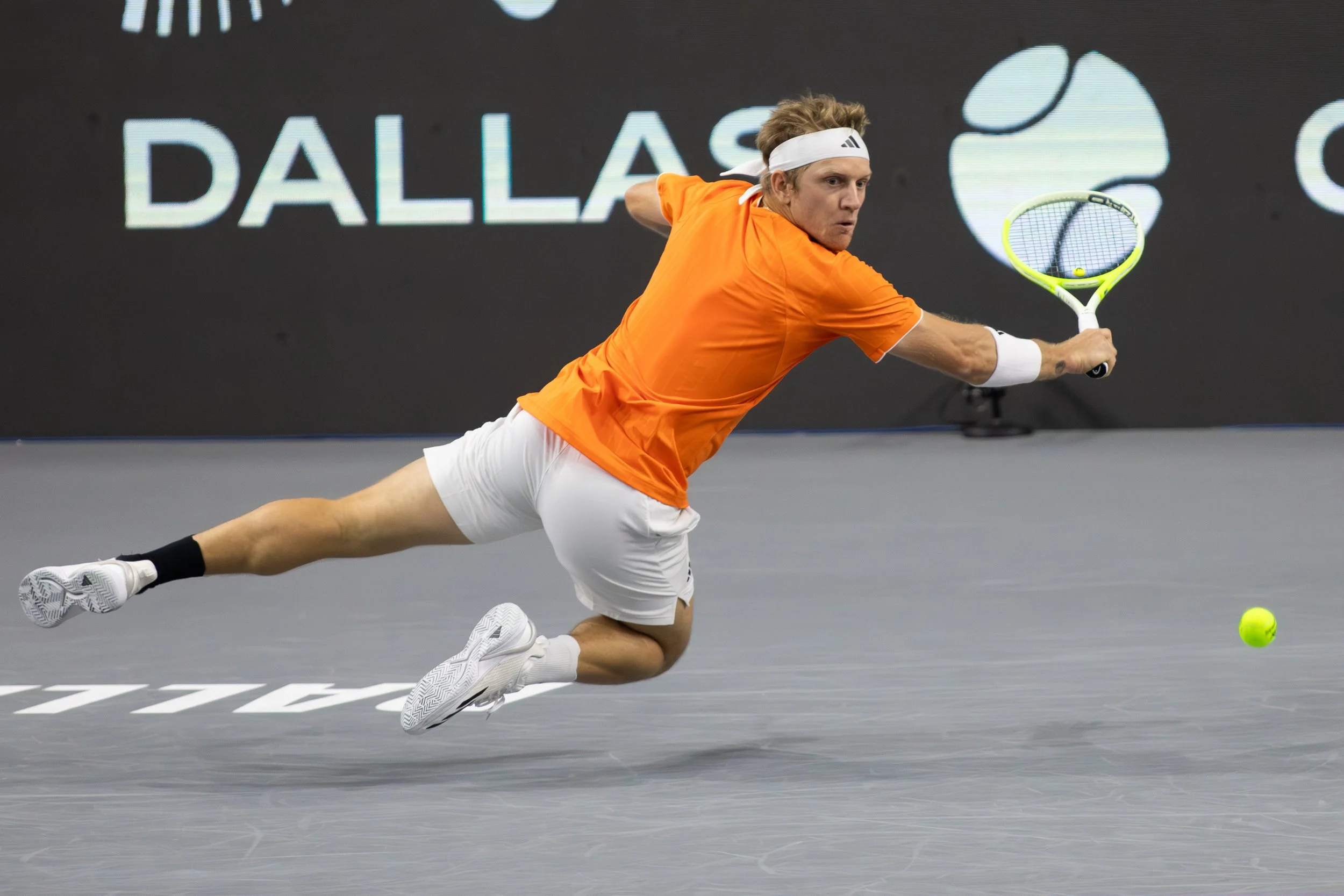 Alejandro Davidovich Fokina (ESP) dives for a backhand shot in a round 2 men's singles match during the 2026 Nexo Dallas Open at the Ford Center at The Star in Frisco, Texas on Wednesday, February 11, 2026. (Daniel McGregor-Huyer/Zuma Press Wire)