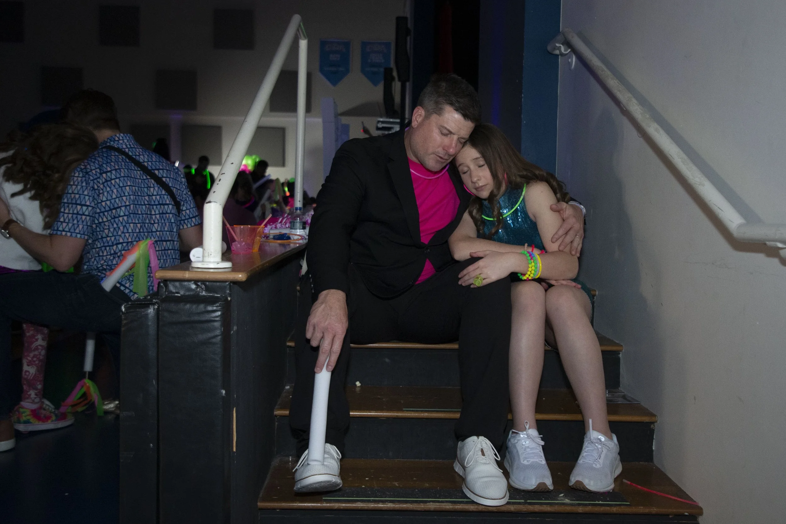 A father and daughter pray together during a Father-Daughter dance in Plano, Texas, on January 31st, 2026.
