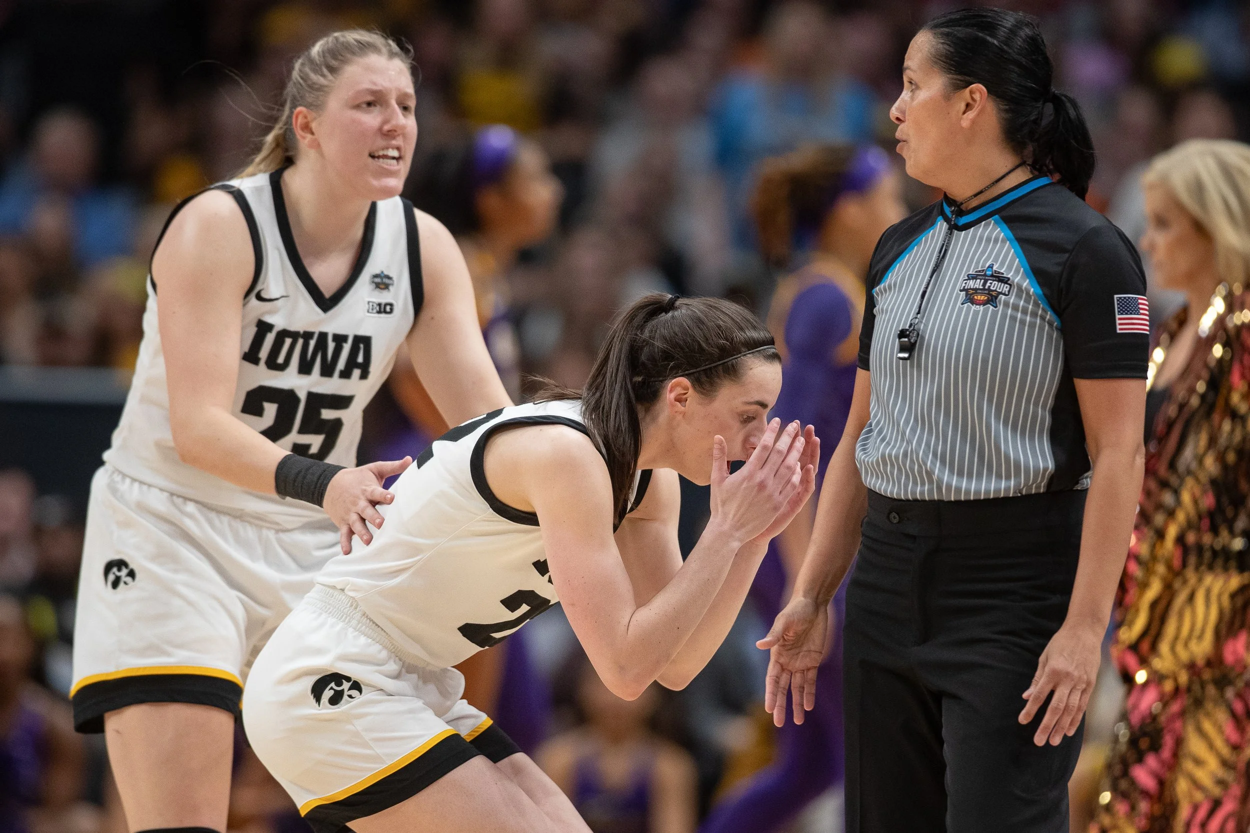 Iowa guard Caitlin Clark (middle) reacts to foul call during the 2023 NCAA Division I Women’s National Championship between Iowa and LSU at American Airlines Arena in Dallas, Texas on Sunday, April 2, 2023. 