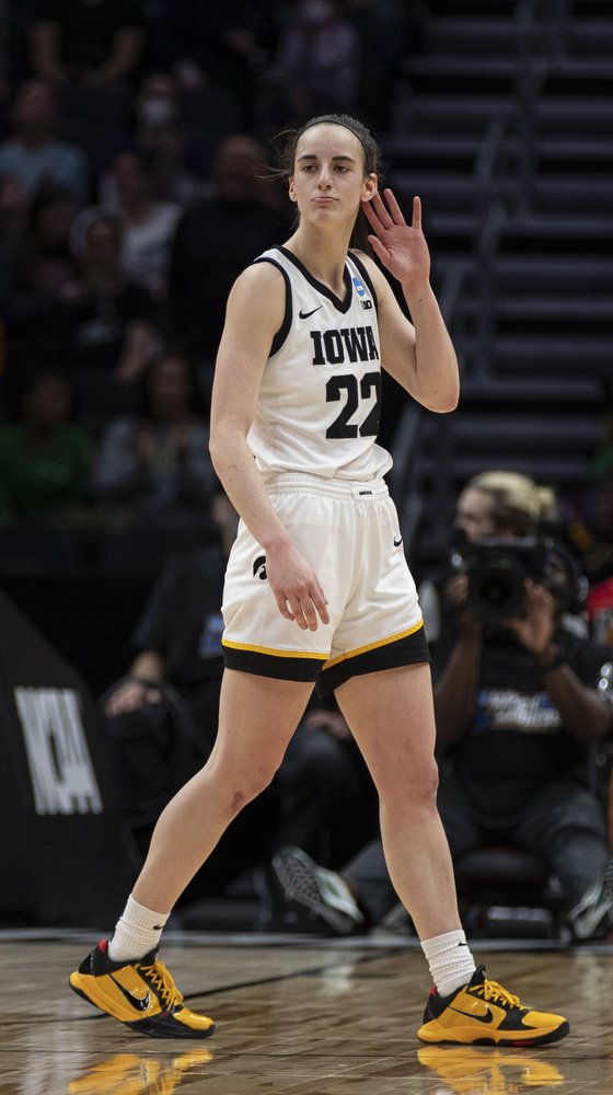 Iowa guard Caitlin Clark (22) celebrates during a 2023 NCAA Women's Basketball tournament Elite Eight game between Iowa and Louisville at Climate Pledge Arena in Seattle, WA on Sunday, March 26, 2023. (Daniel McGregor-Huyer/The Daily Iowan)