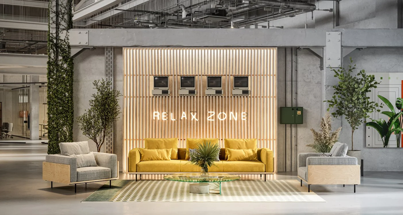Modern, industrial-style lounge with plush seating, curated greenery, and a 'Relax Zone' sign, blending sophistication with understated comfort.