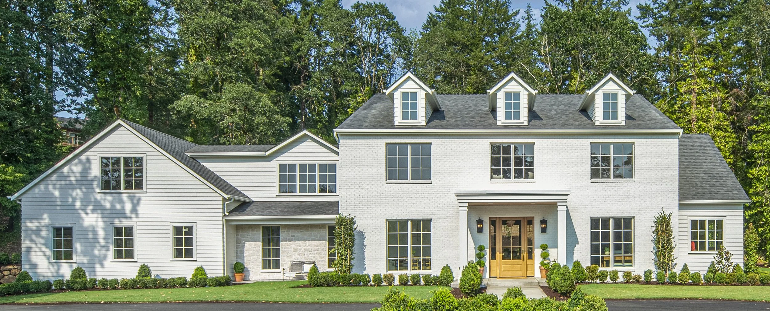 Modern white house with a brick facade in Salem, Oregon