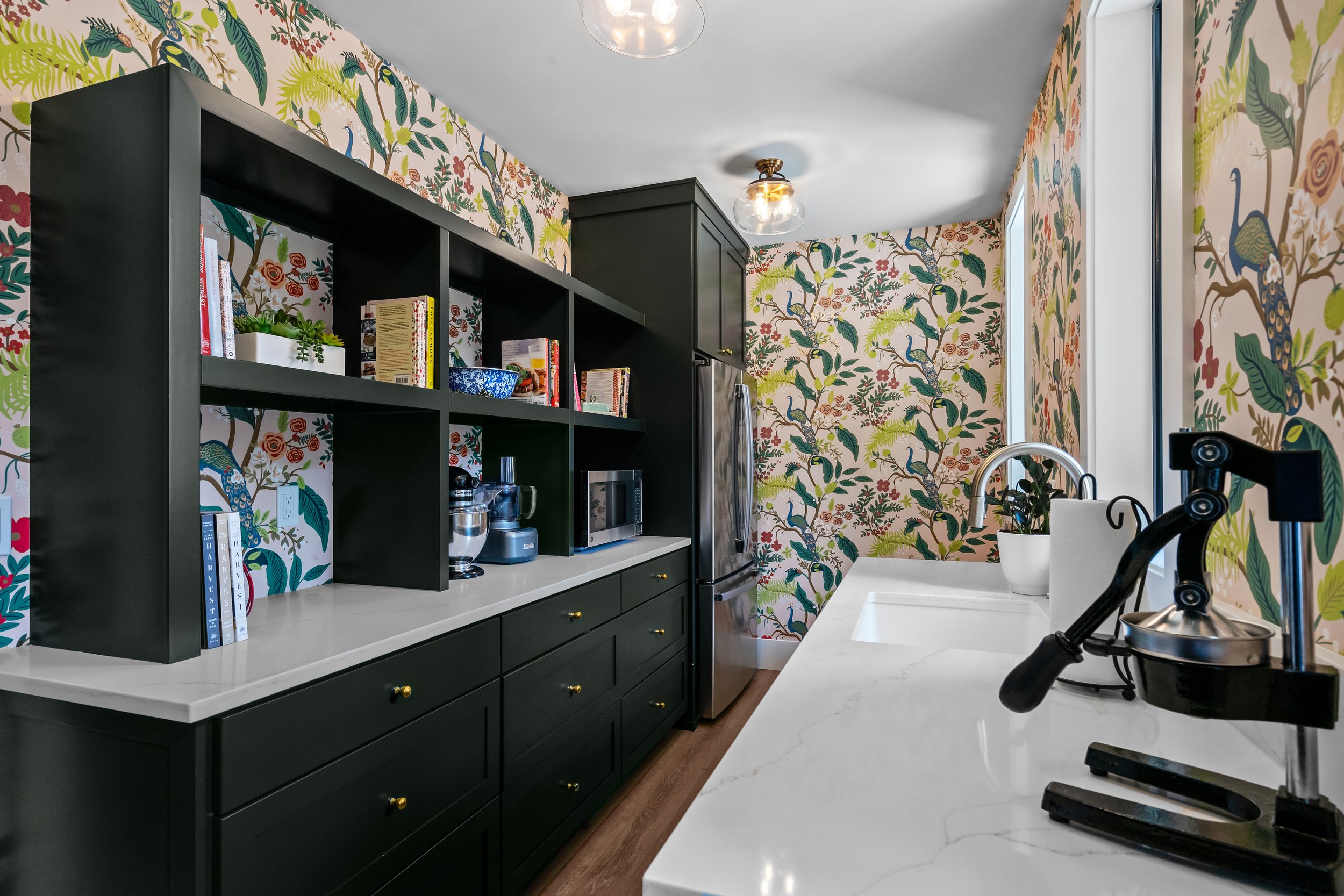 Walk-in pantry with built-in storage and custom cabinetry in a Salem, Oregon home.