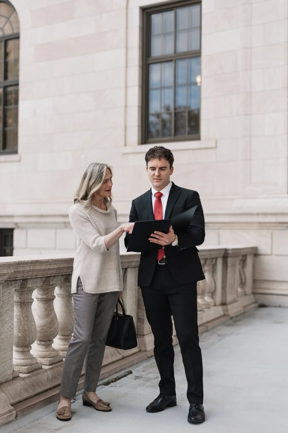 Minneapolis DWI attorney speaking with client