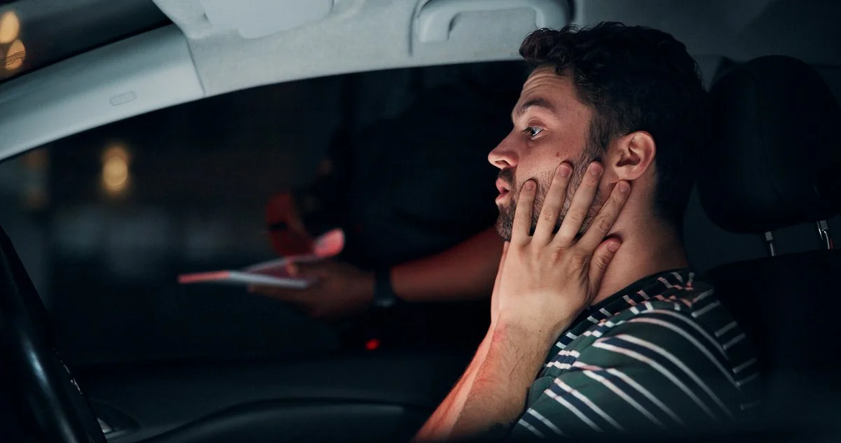 man being stopped by police for breaking DWI laws in Minnesota