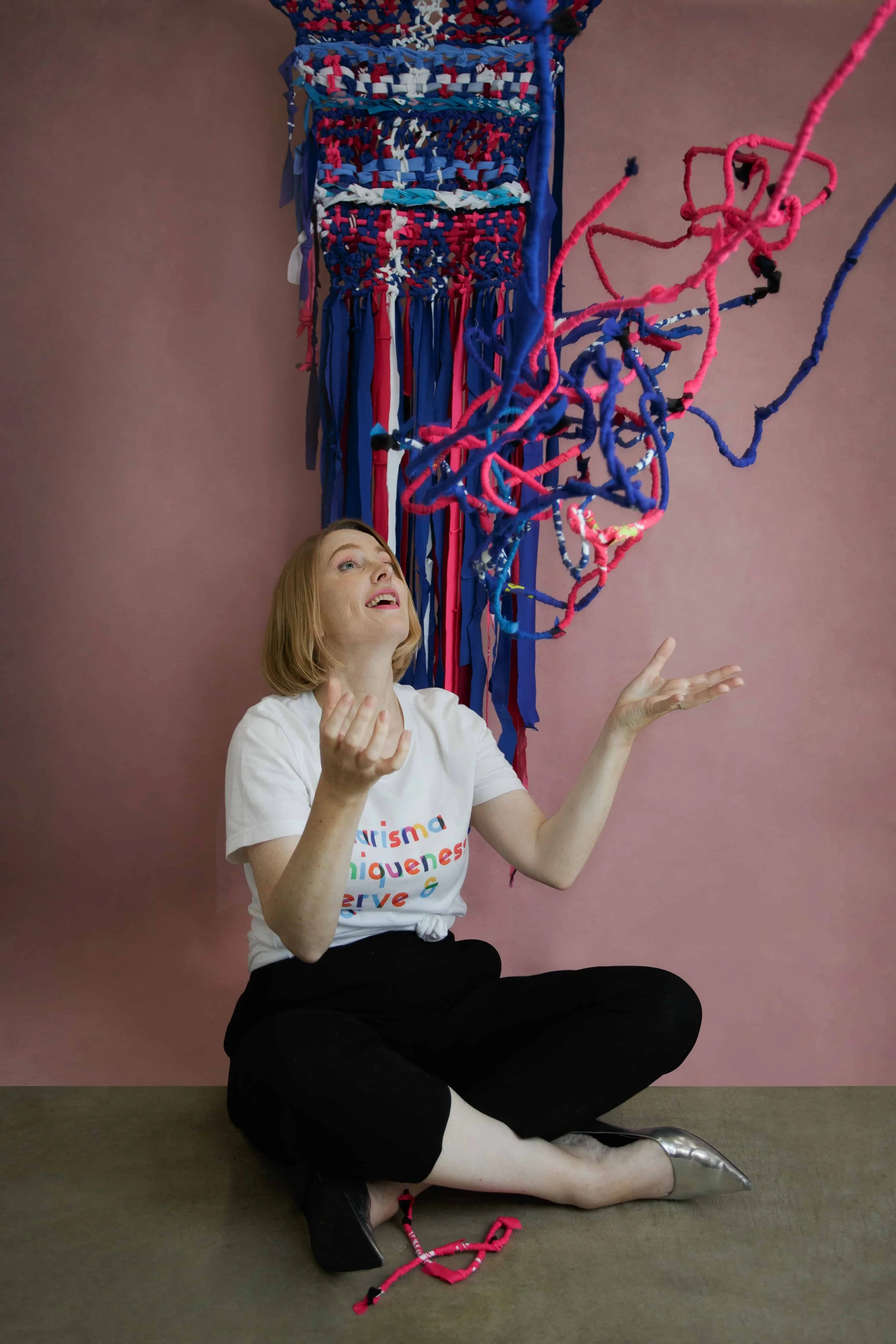 Women throwing yarn in the air | Corporate Workshops