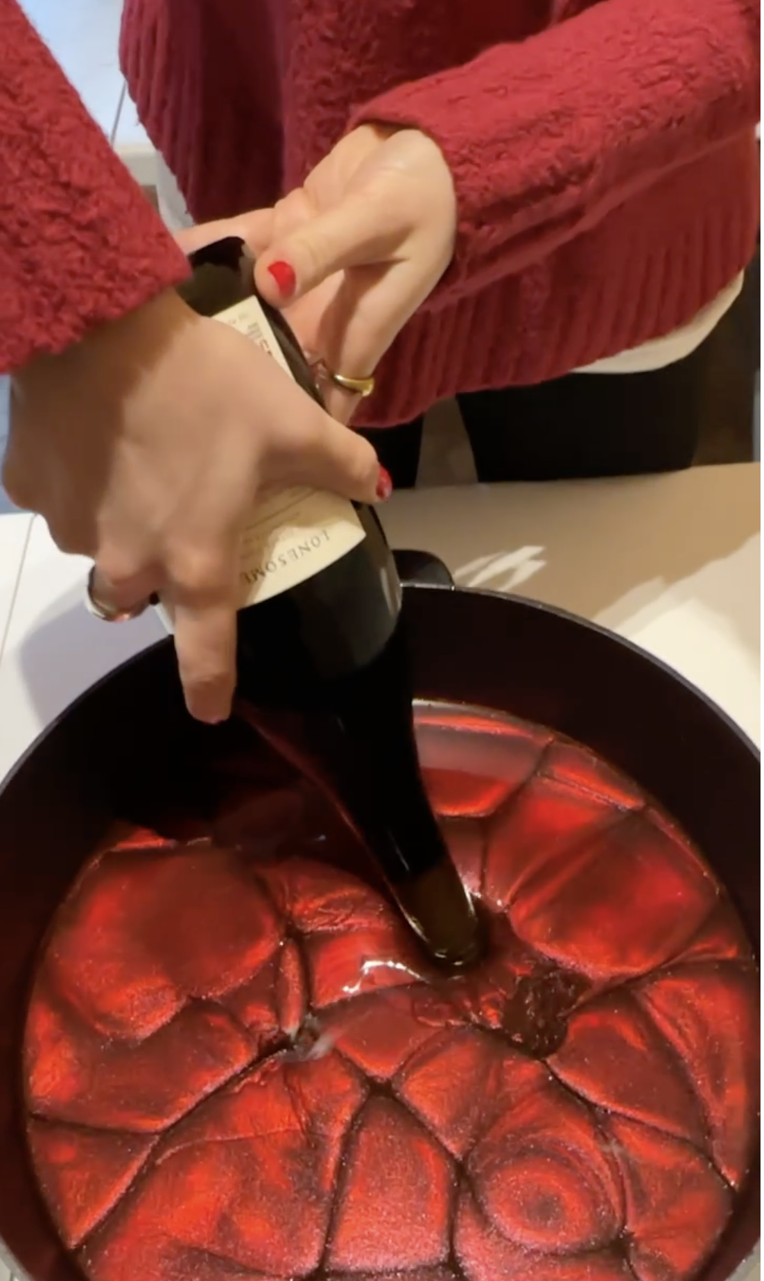 Waxing 2023 Estate Pinot Noir by hand