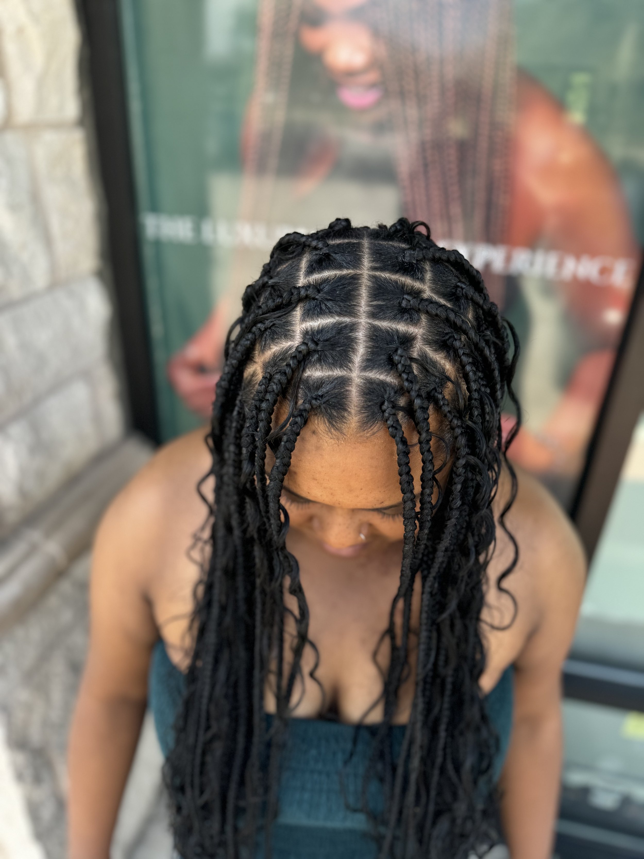 Large boho braids with long curly human hair at Legacy Braids in McKinney, TX