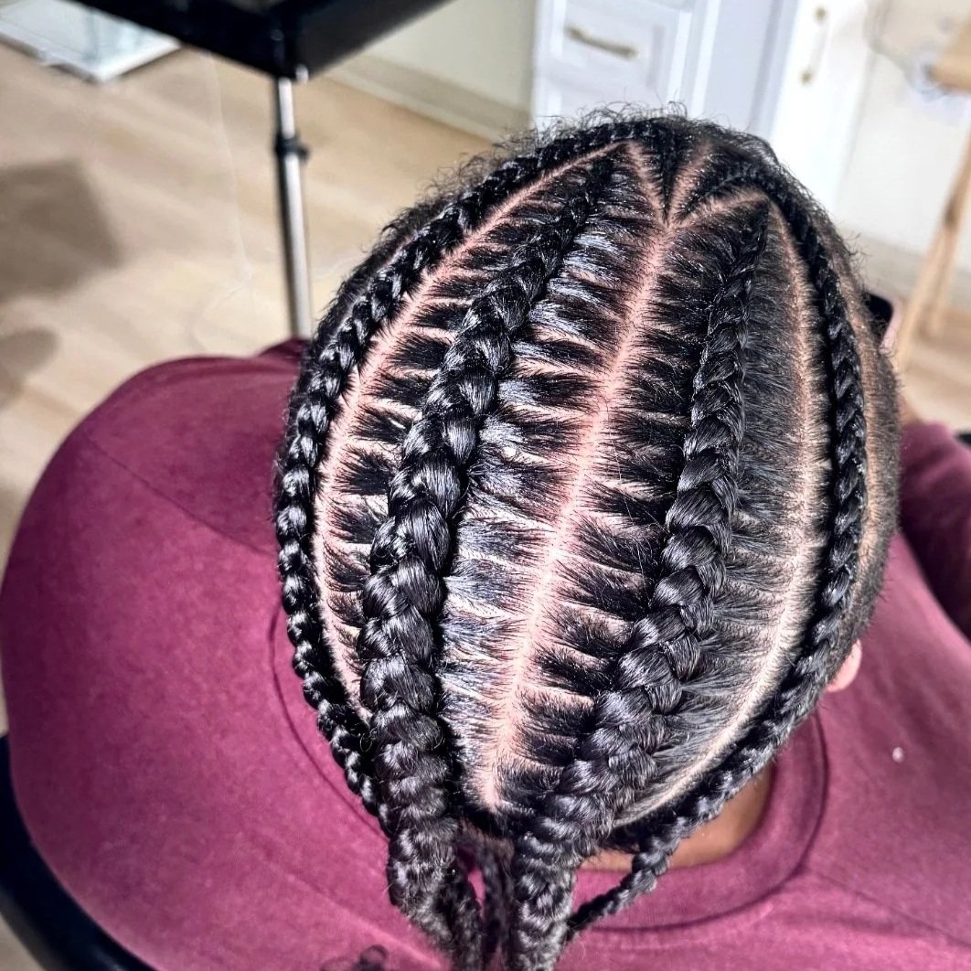 Men’s two stitch braids with clean, defined parting