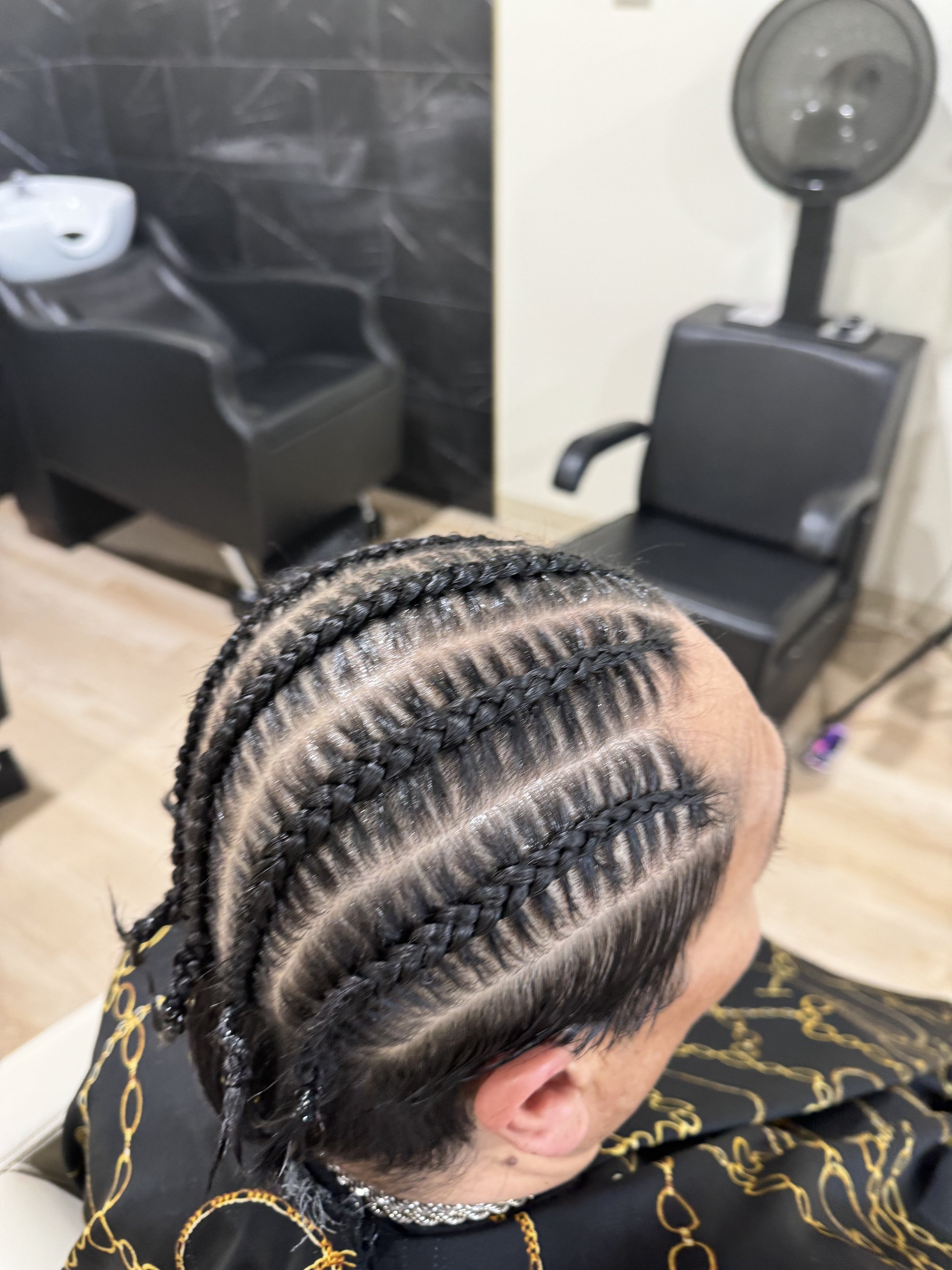 Men’s stitch braids with a detailed stitch pattern and defined sections
