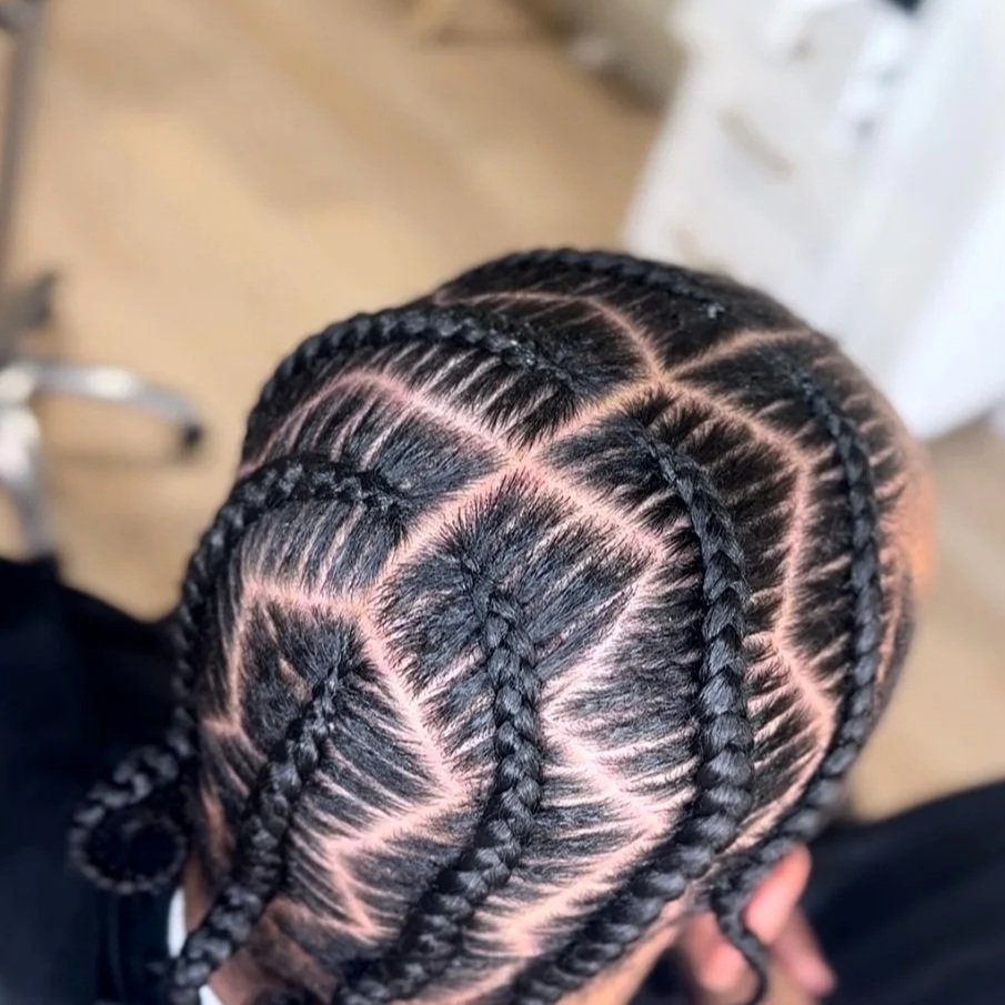 Men’s stitch braids with a geometric scalp design