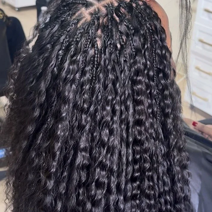 Extra-high-density boho braids with a dramatic, full curly finish at Legacy Braids in McKinney, TX