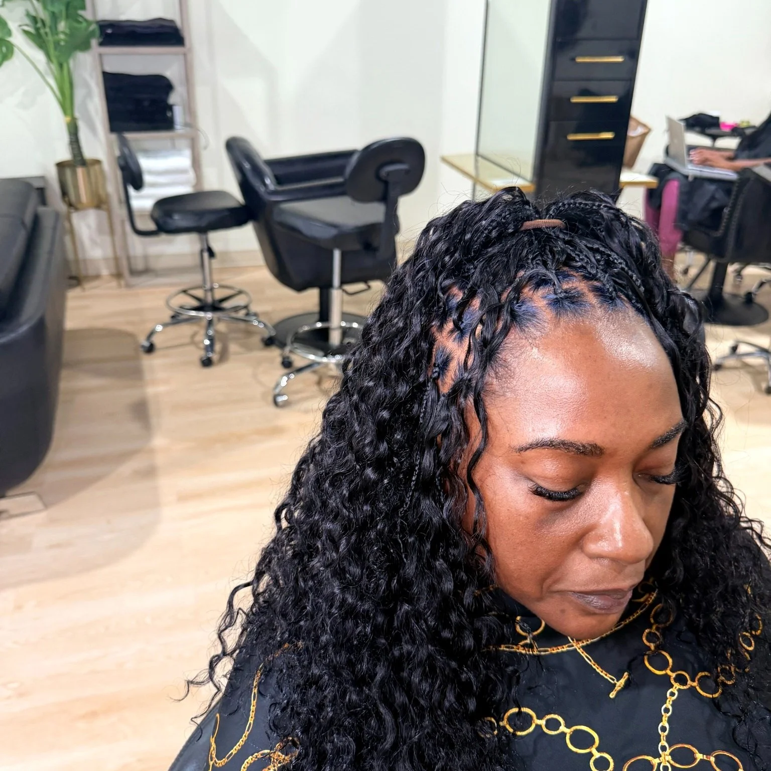 Miracle Knots with black Deep wave human hair and a natural-looking finish at Legacy Braids in McKinney, TX