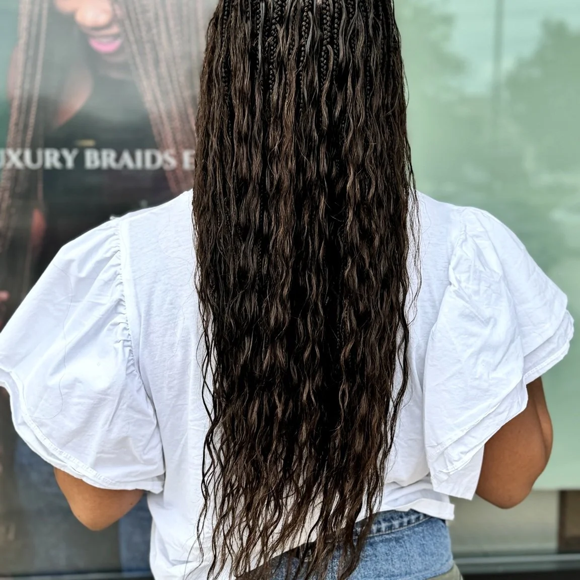 Miracle Knots with wet and wavy curls for a natural textured finish at Legacy Braids in McKinney, TX