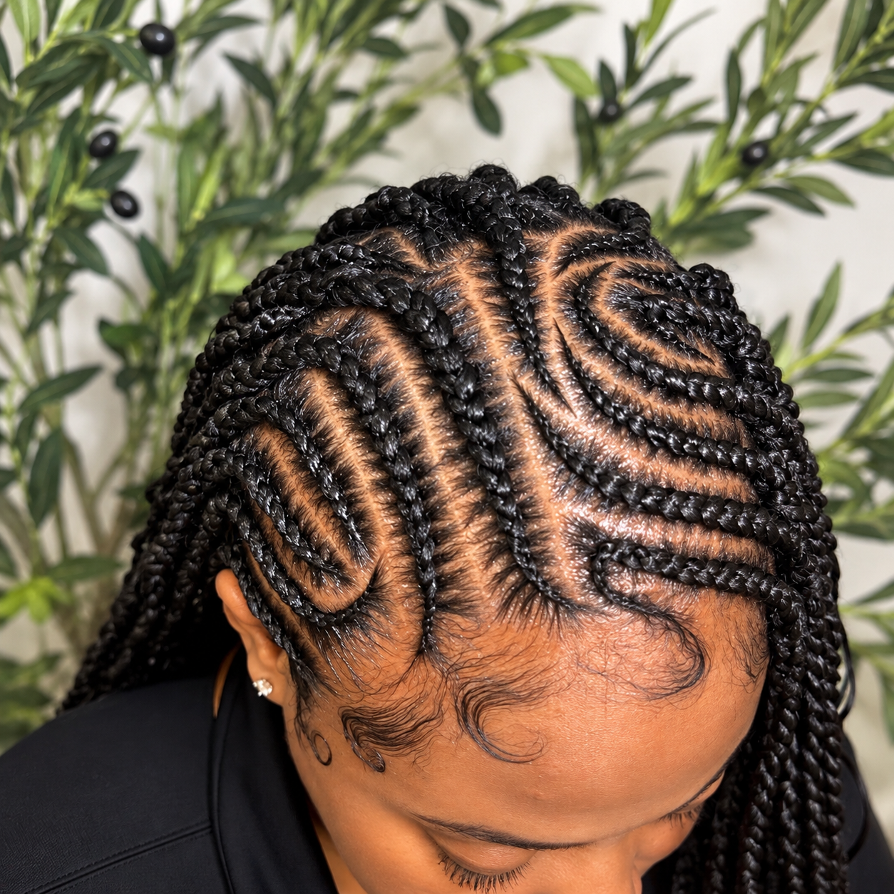 Sculpted Cornrows with Botanical Bokeh.png