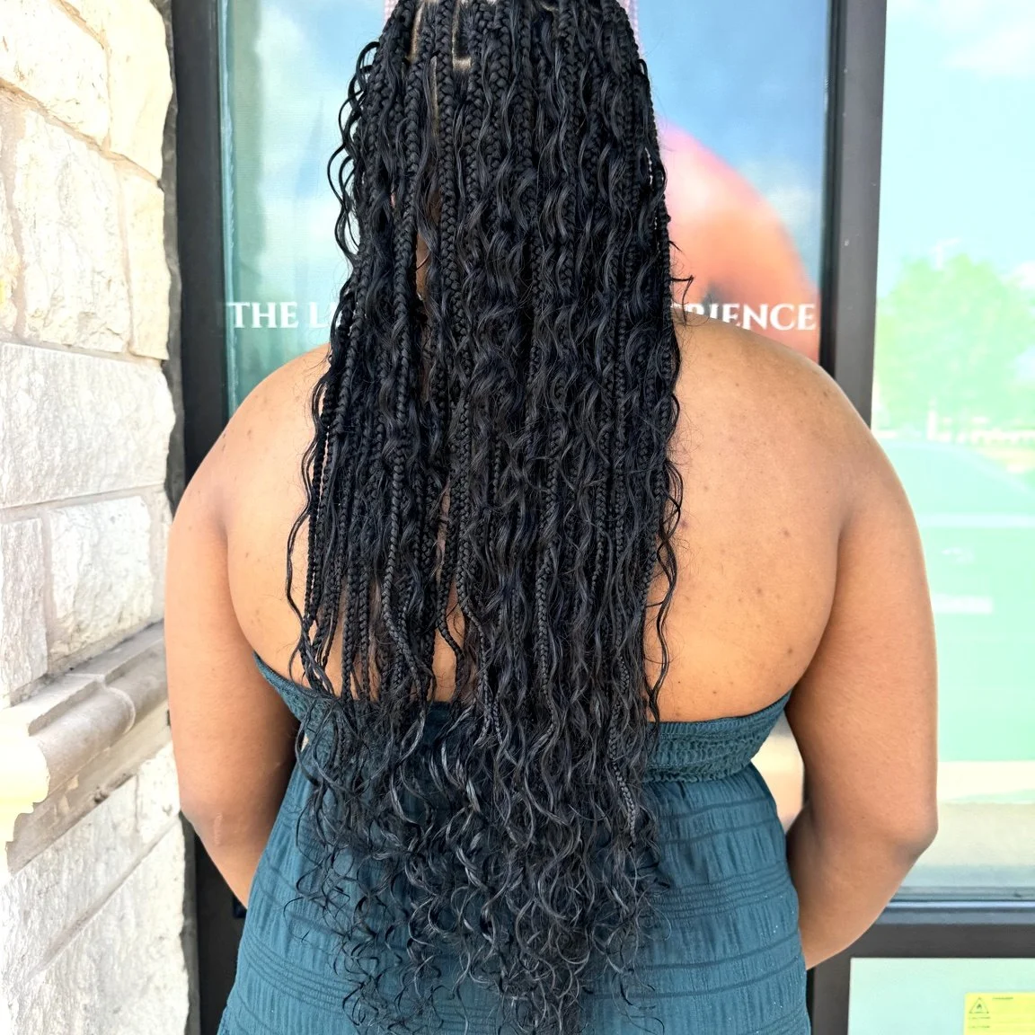 Jumbo boho braids with long curly human hair at Legacy Braids in McKinney, TX