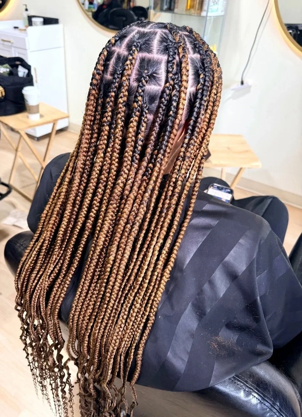 Large knotless braids with clean parting and long braided lengths at Legacy Braids in McKinney, TX
