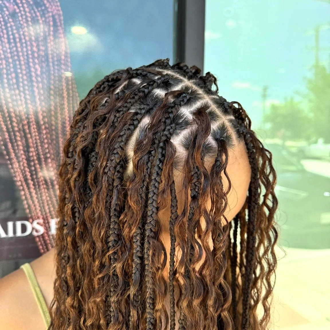 Small-medium boho braids with curly human hair at Legacy Braids in McKinney, TX