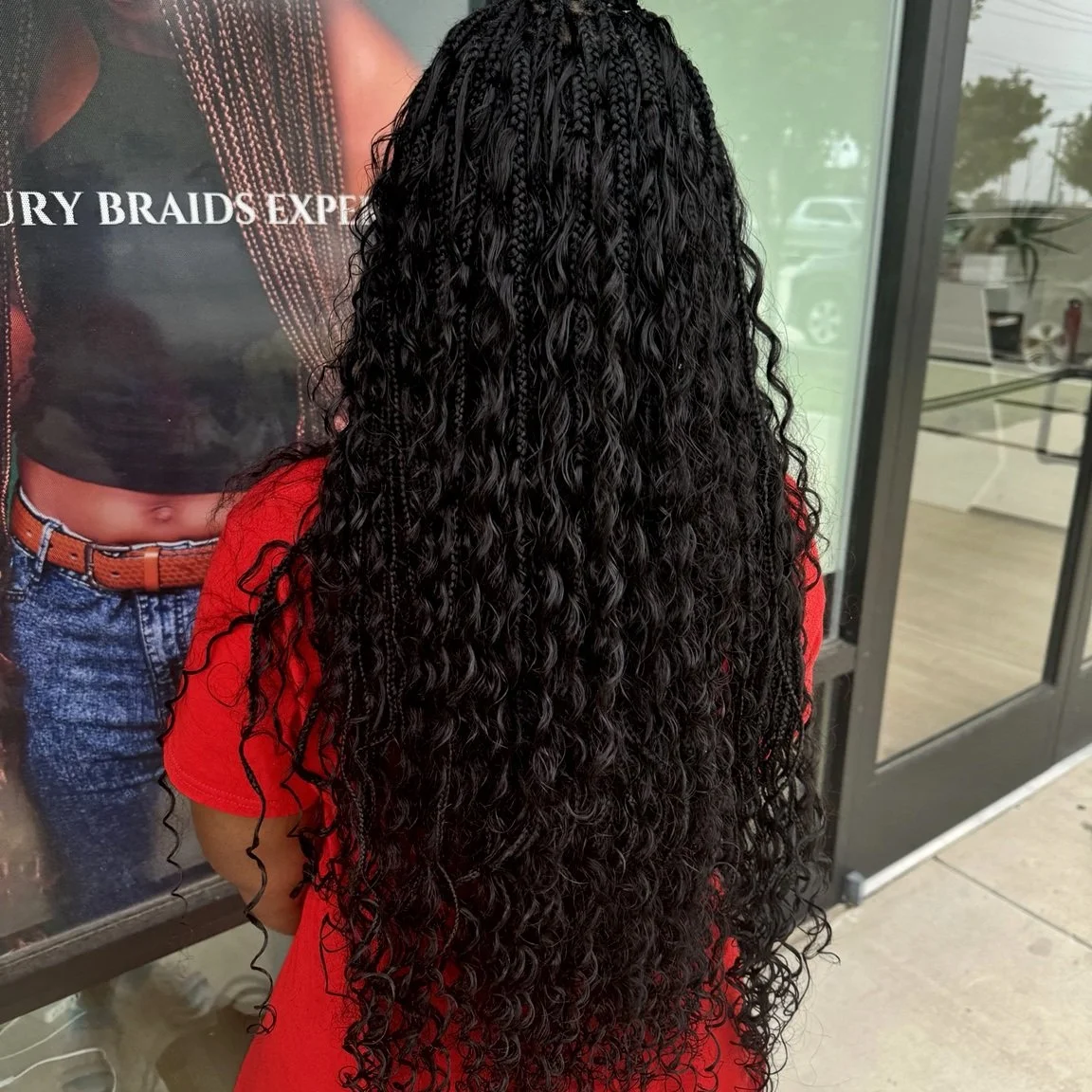 Miracle Knots with wet and wavy curls for a natural textured finish at Legacy Braids in McKinney, TX