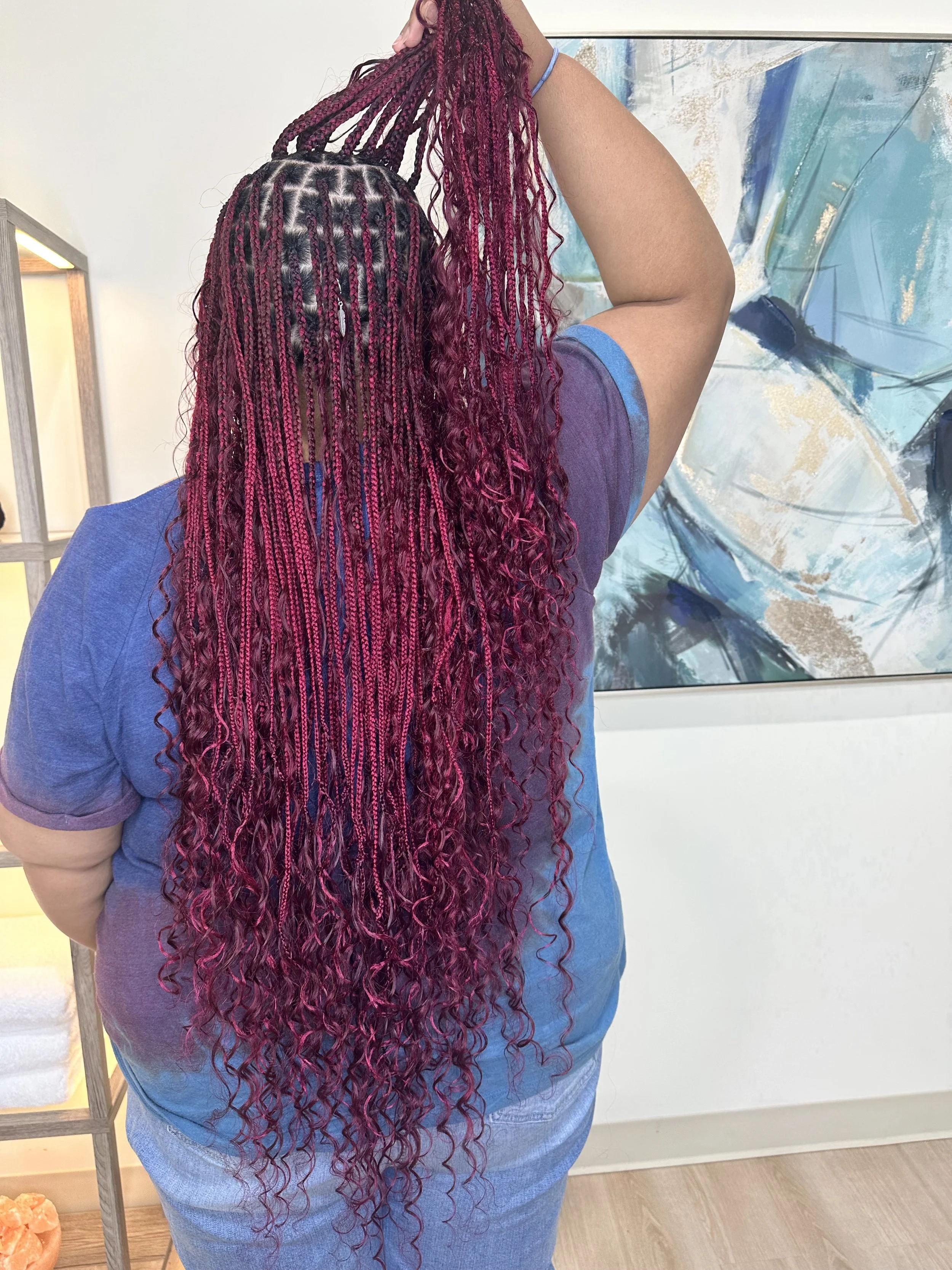 Long burgundy boho braids with curly human hair at Legacy Braids in McKinney, TX