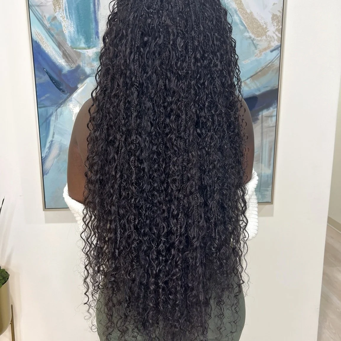 High-density boho braids with maximum fullness and curly human hair at Legacy Braids in McKinney, TX
