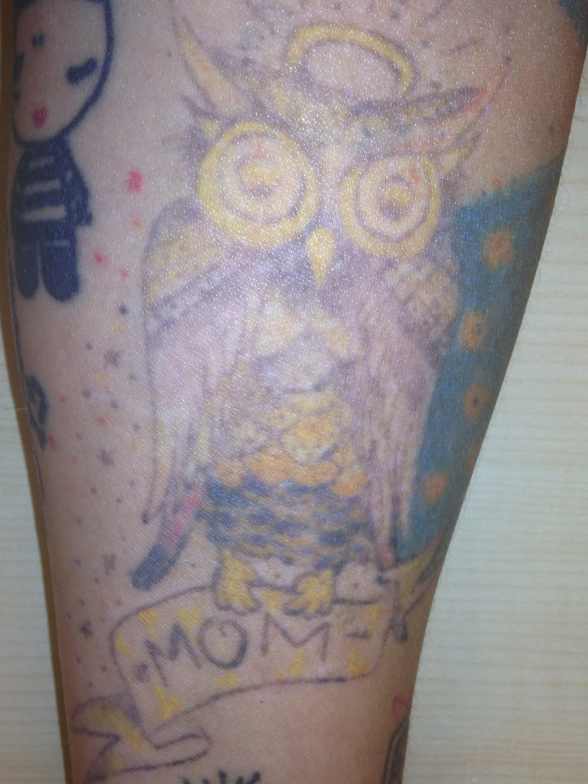 Color tattoo removal of the owners tattoo.  Tattoo fading for coverups