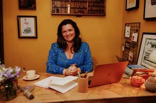 KELLY T AT DESK.jpeg