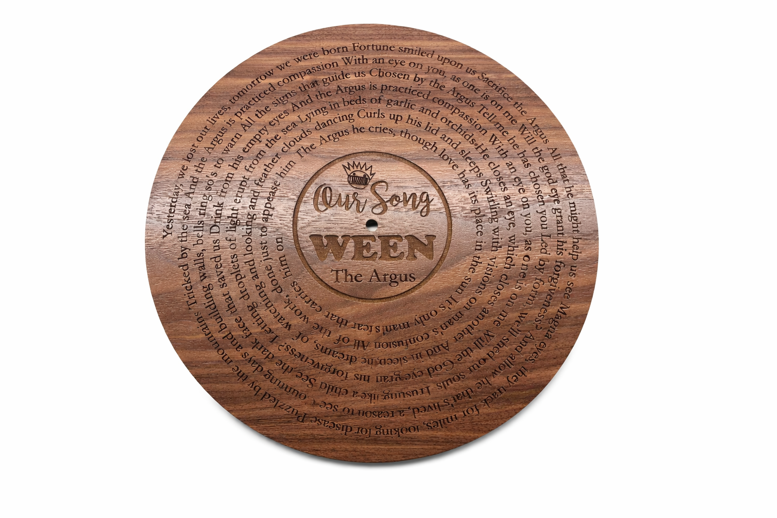 Personalized wooden record plaque mounted on living room wall
