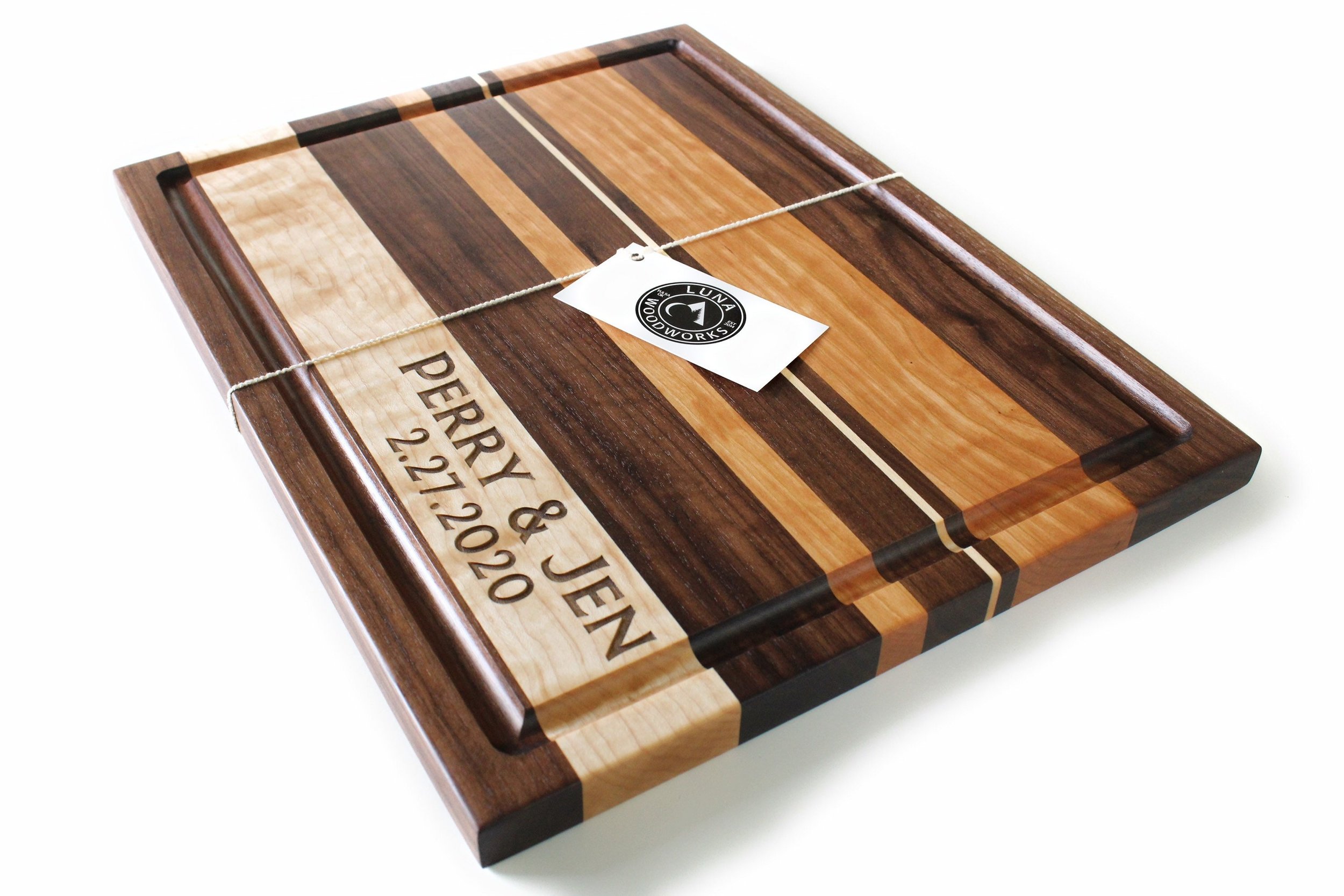 Our custom engraved large cutting board makes the perfect gift. Personalized with names, dates or a business logo, it is sure to make a lasting impression. Made in America.