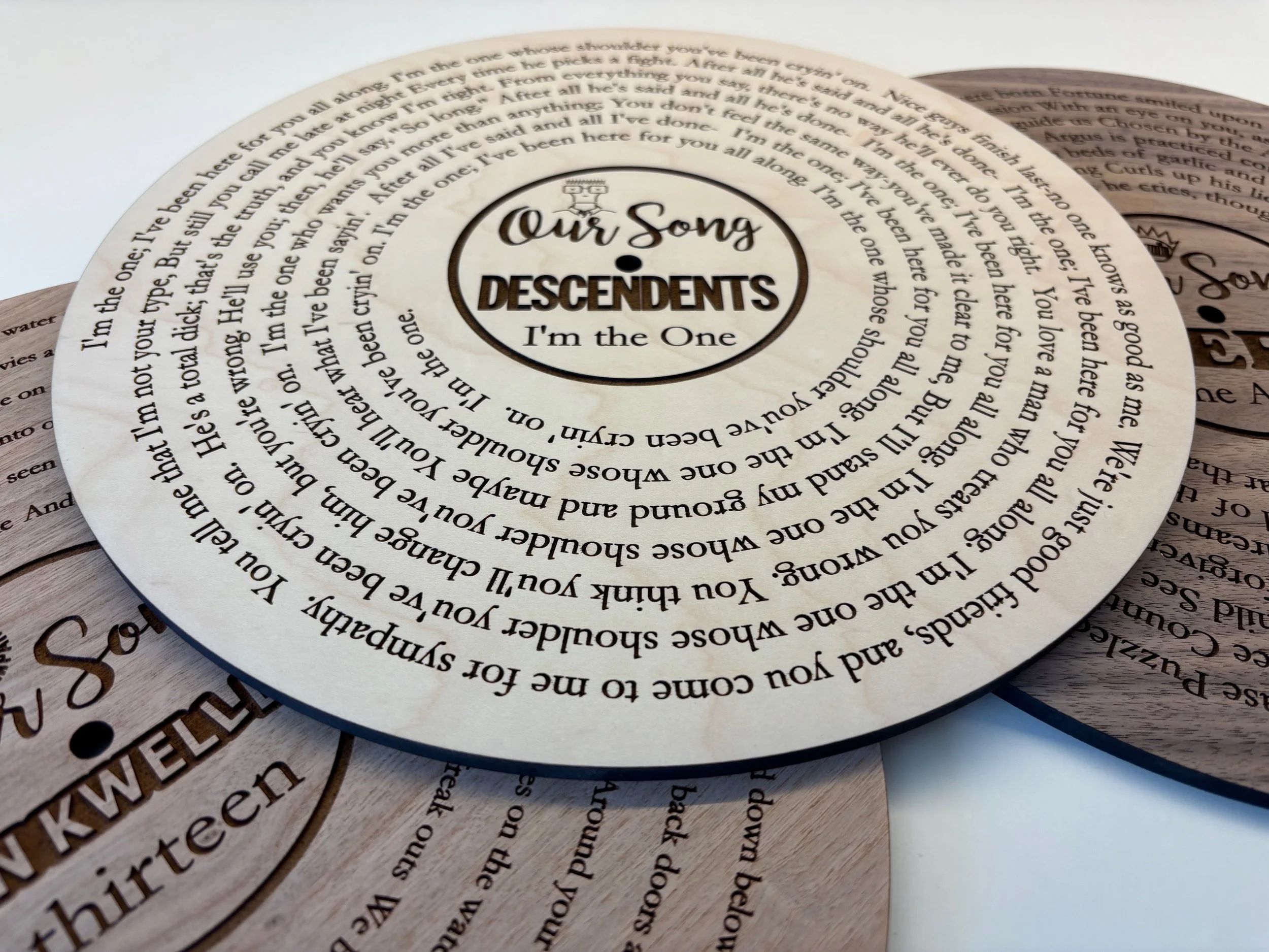 Handmade walnut wooden vinyl record engraved lyrics detail
