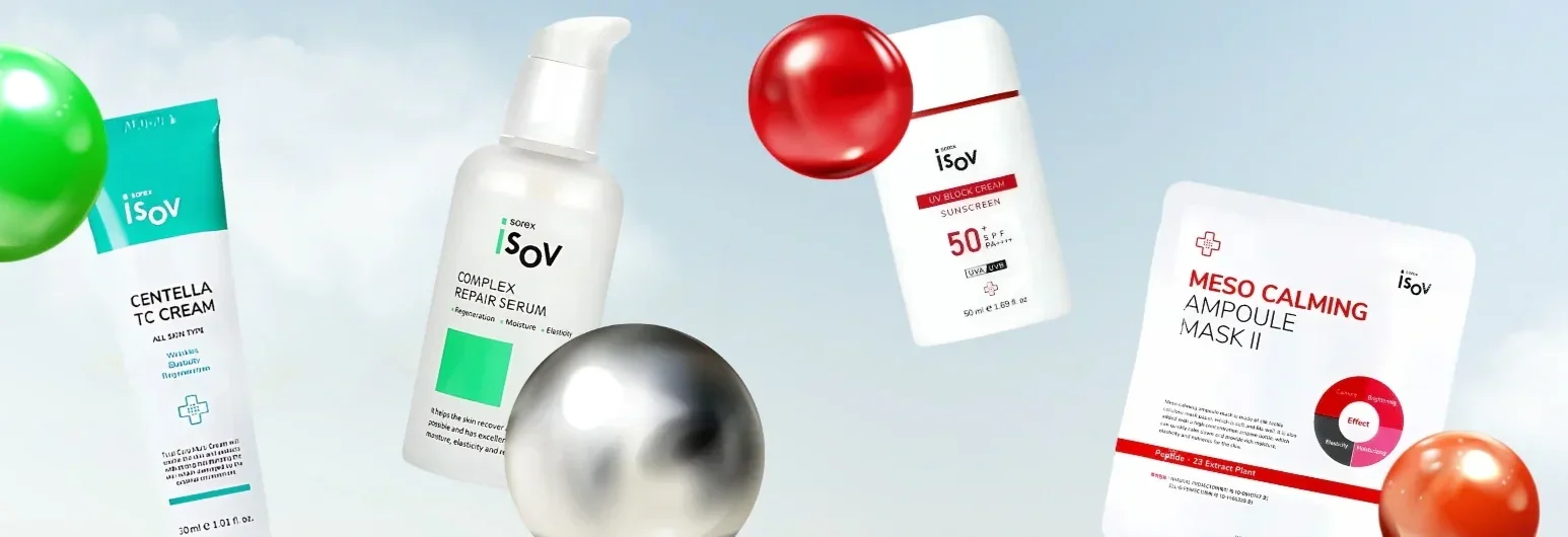 Collection of skincare and sunscreen products with colorful spheres in a light blue background.